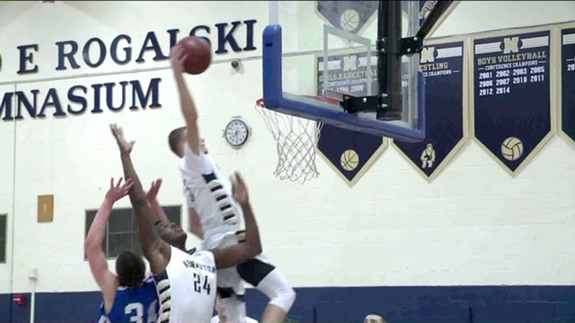 Newington High School boys basketball player makes impressive shot