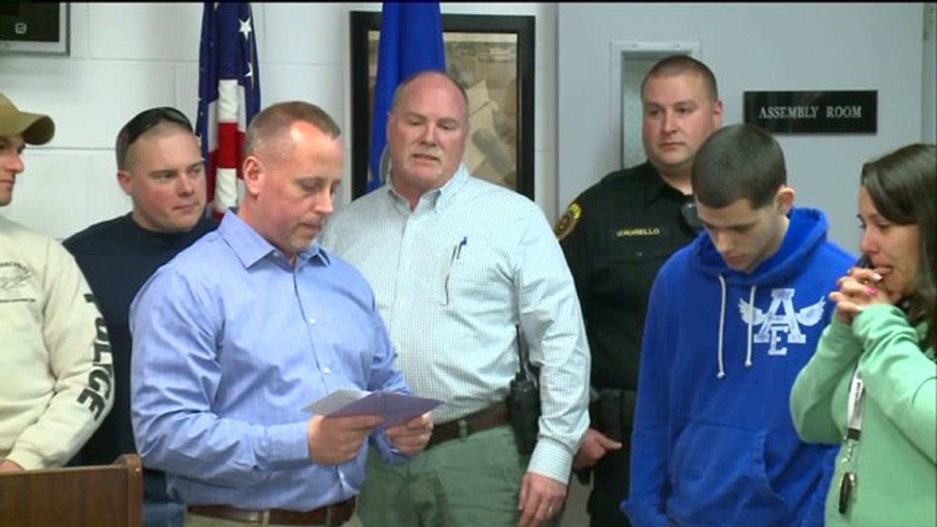 Wolcott Police Department gives family gift card after fire