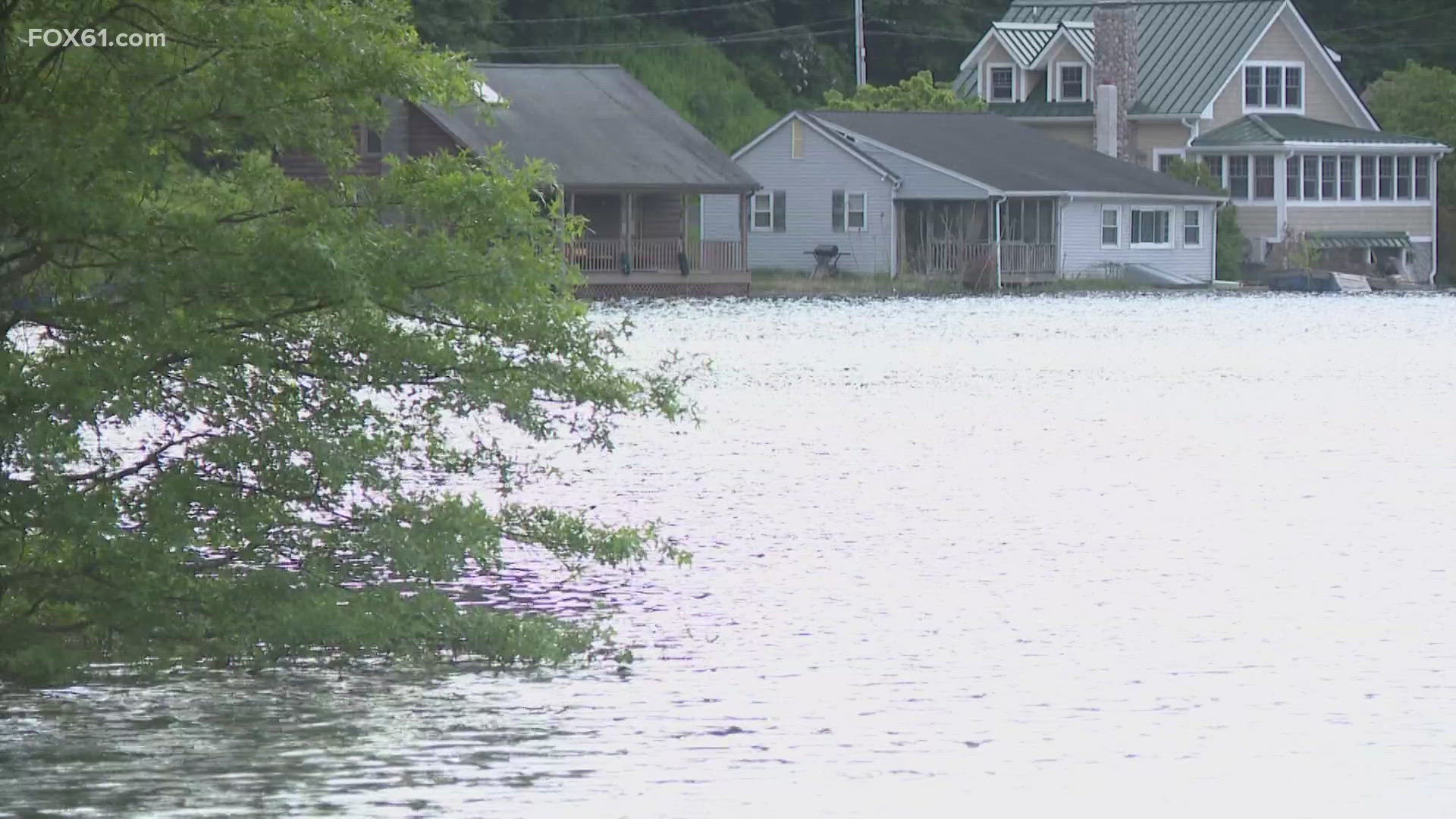 The waters on Jobs Pond in Portland rise whether it rains or not. Some homeowners have been forced to leave while others are stuck holding their breaths.