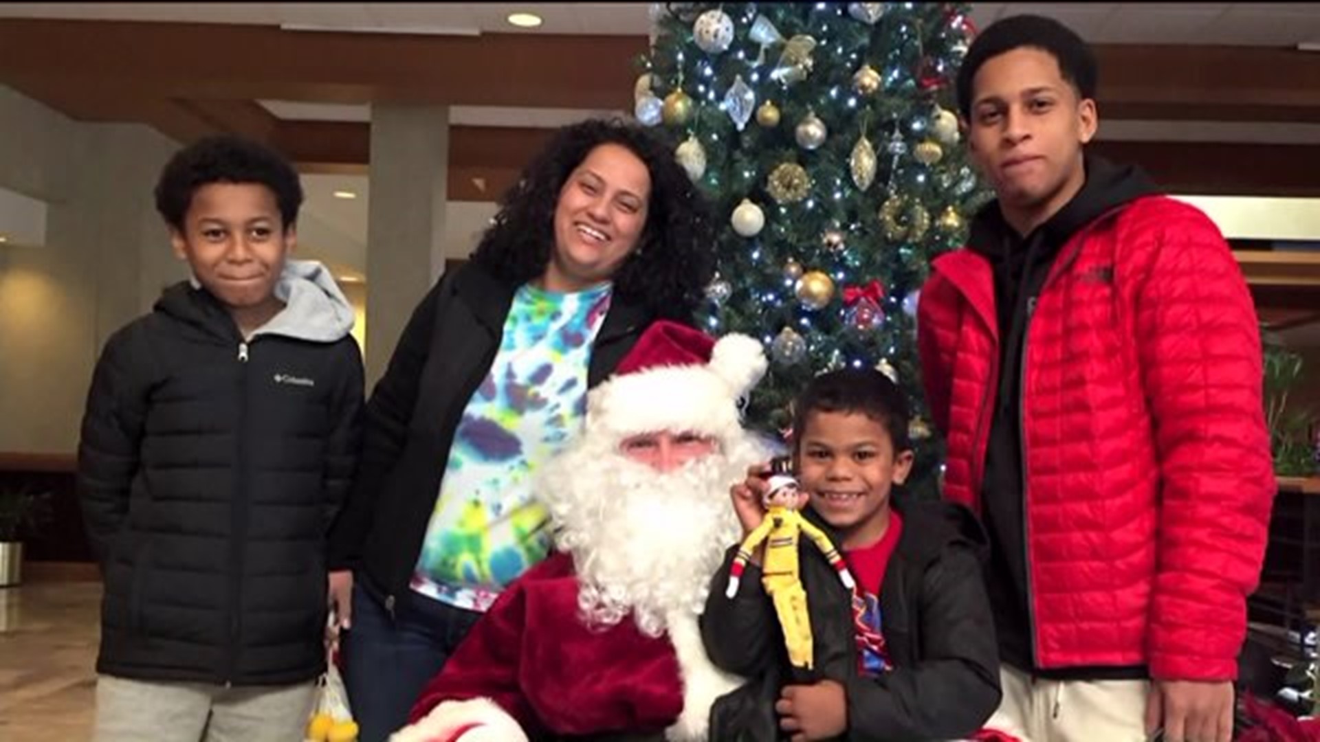 Santa visits victims of Bridgeport condo fire who lost everything right after Christmas