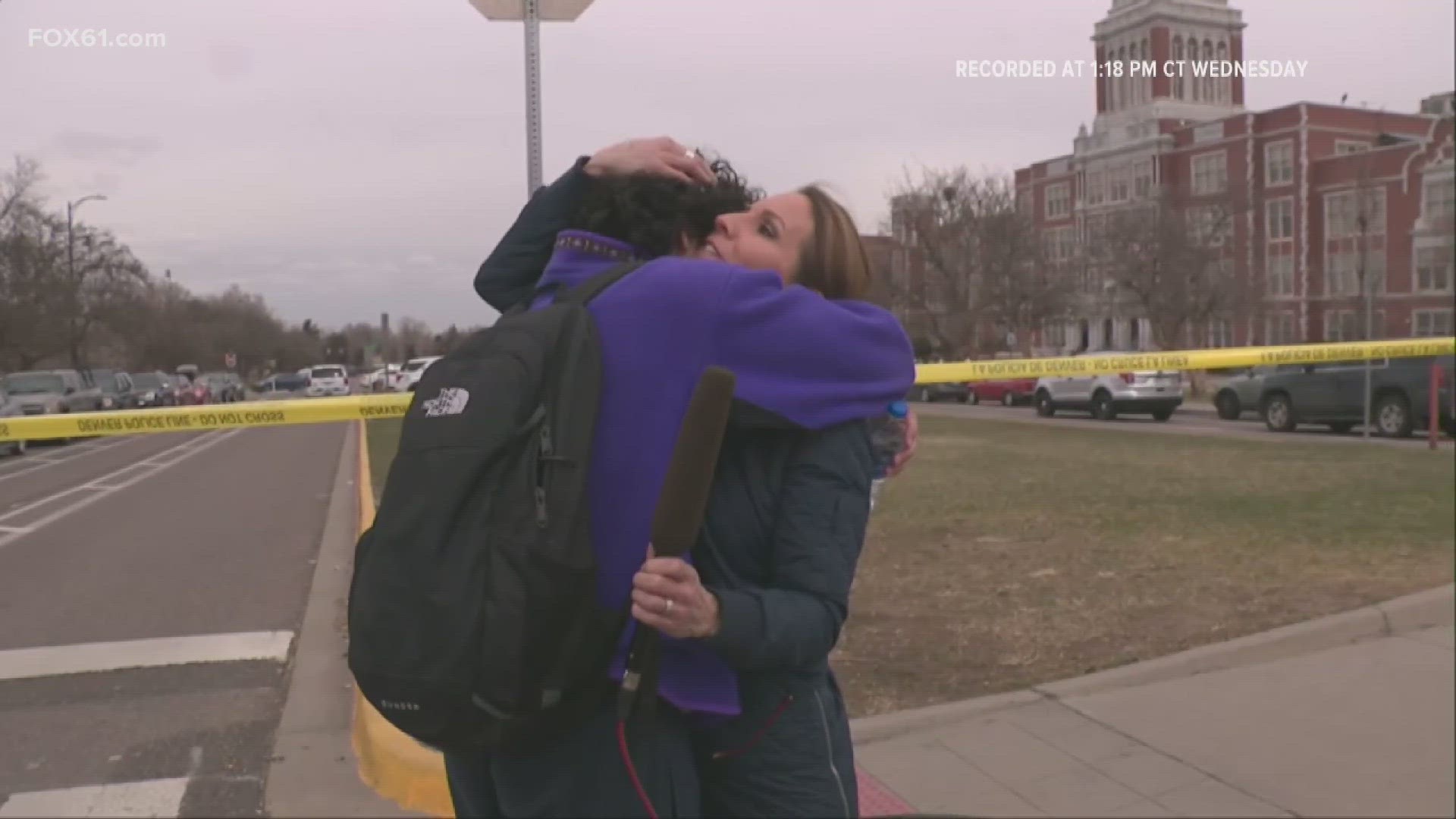 Fox News Reporter Alicia Acuna reunited with her son while live and in the middle of a report in Denver after a shooting happened at East High School.