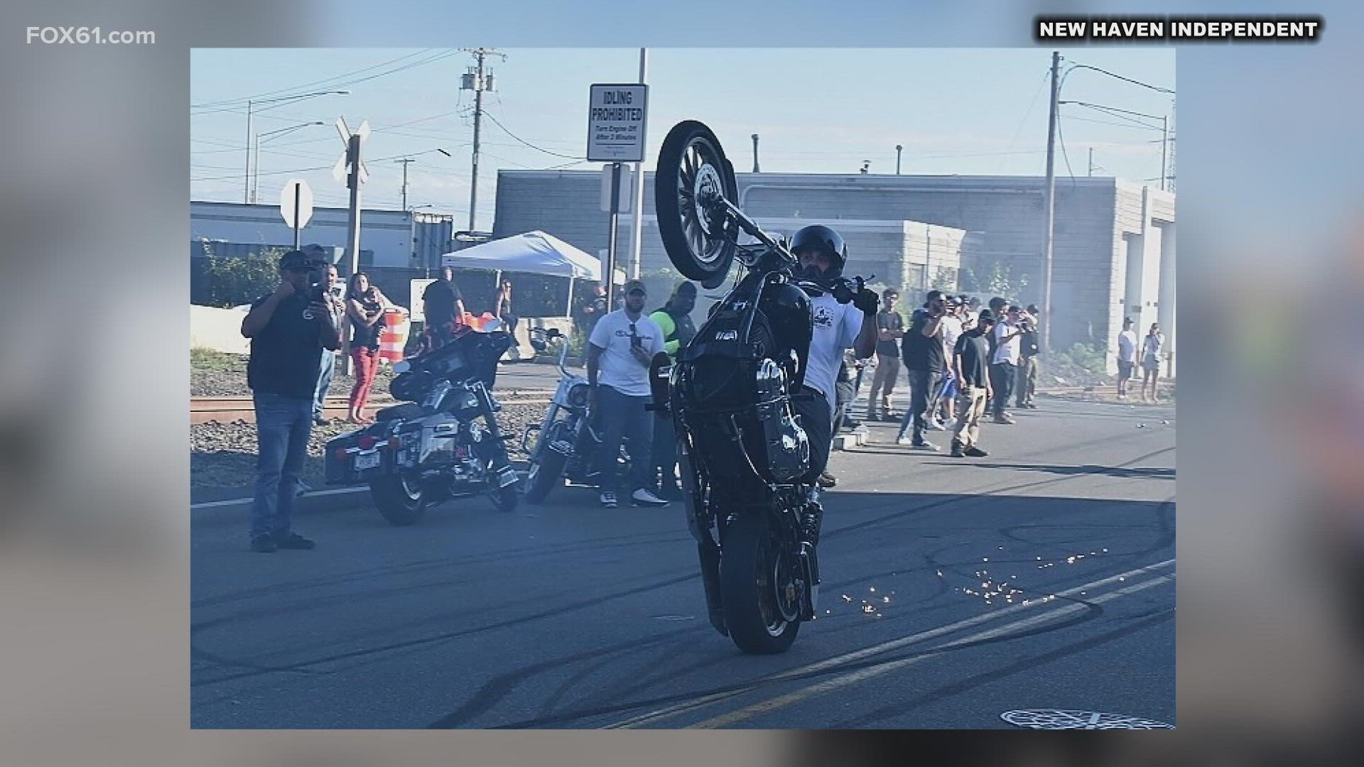 New Haven police charged the organizer of the motorcycle rally with inciting a riot.