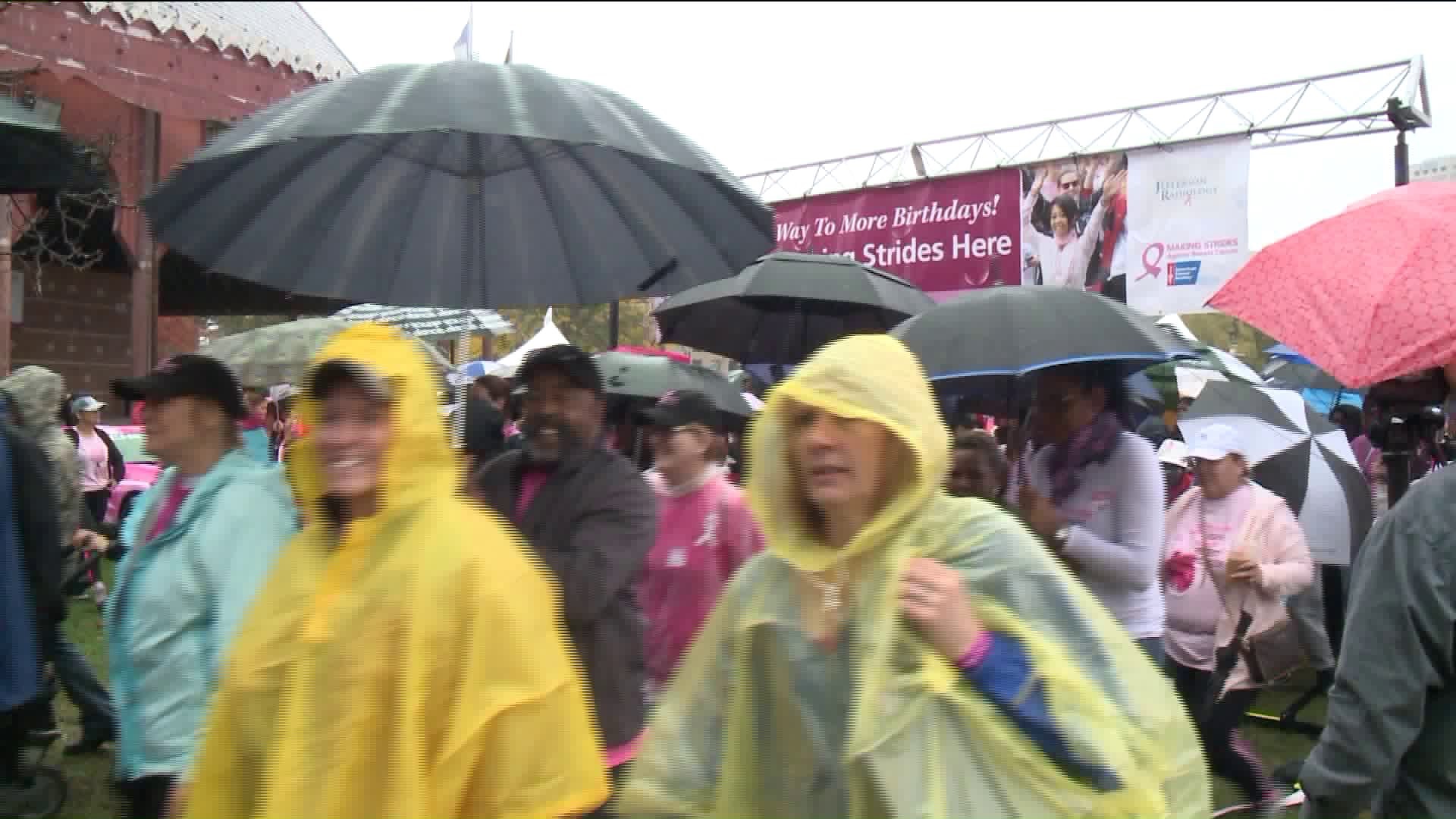 Walking in the rain to fight against breast cancer
