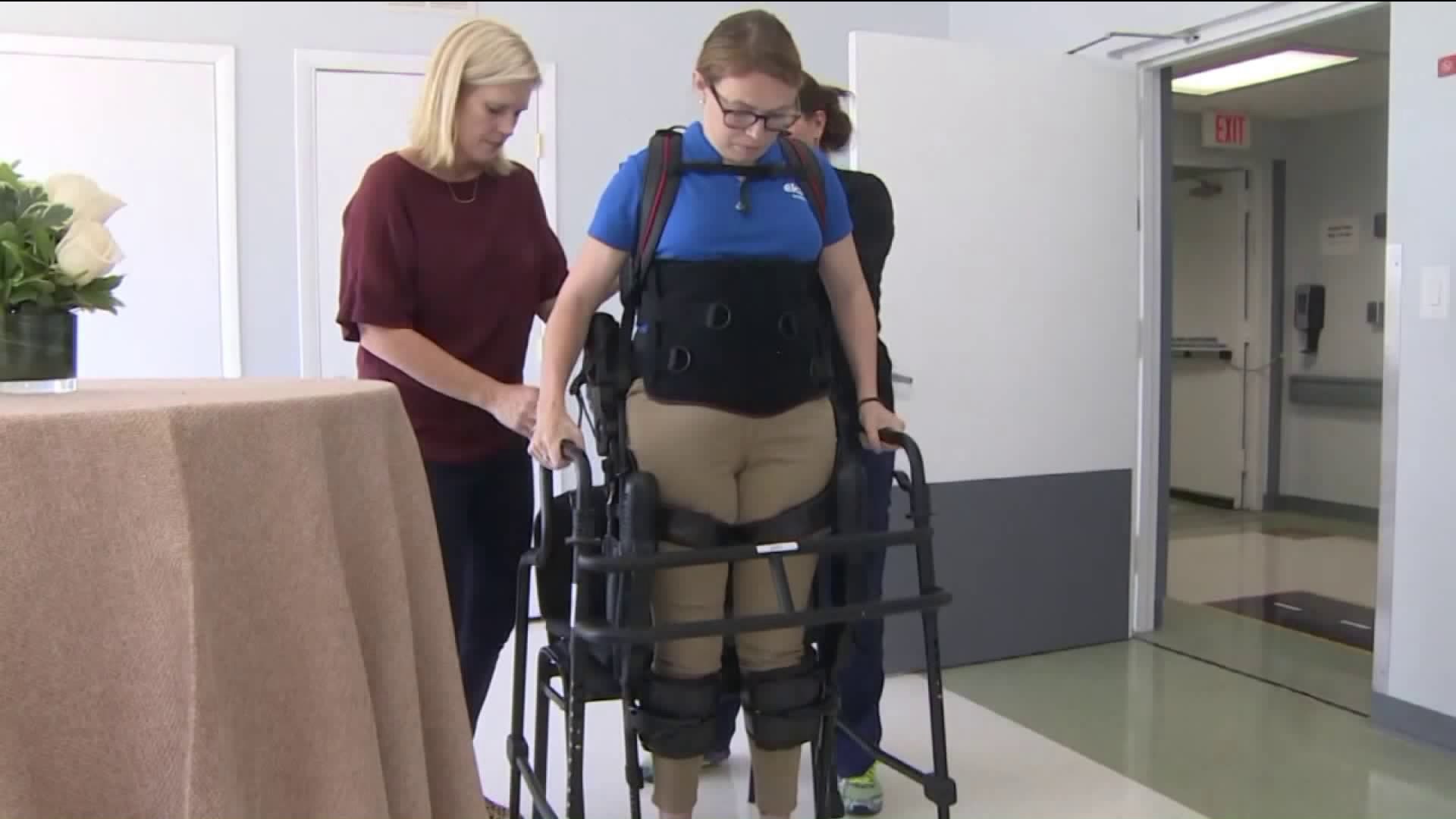 Paralyzed Patients use exoskeleton to walk again