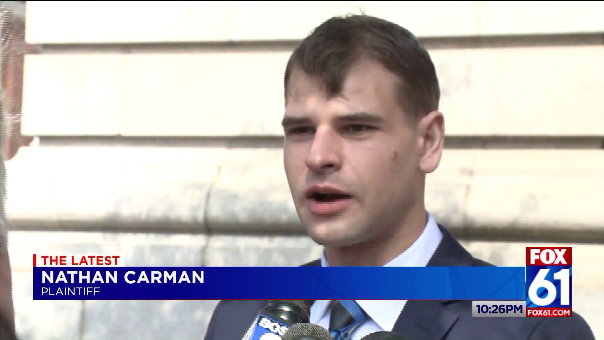 Nathan Carman speaks after closing arguments in insurance case