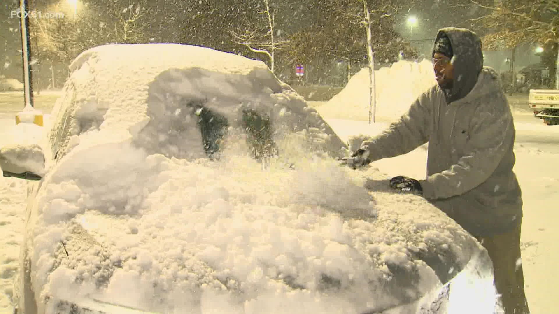 New Haven county cleans up after morning snow storm