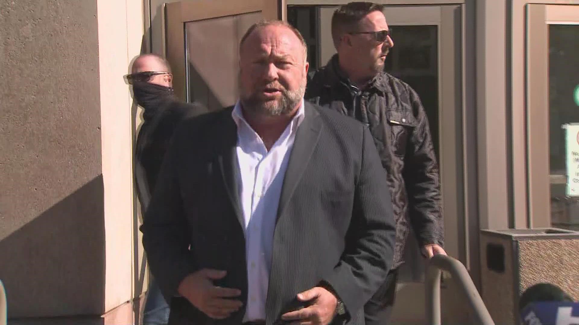 Alex Jones spoke to the media during the Friday morning recess of the defamation trial into his claims that the Sandy Hook shooting was a hoax.
