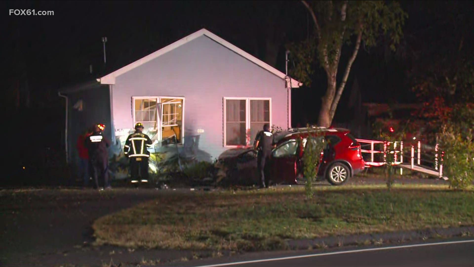 The car slammed into a house on Meriden Avenue Thursday night. It is unclear if anyone was injured in the crash.