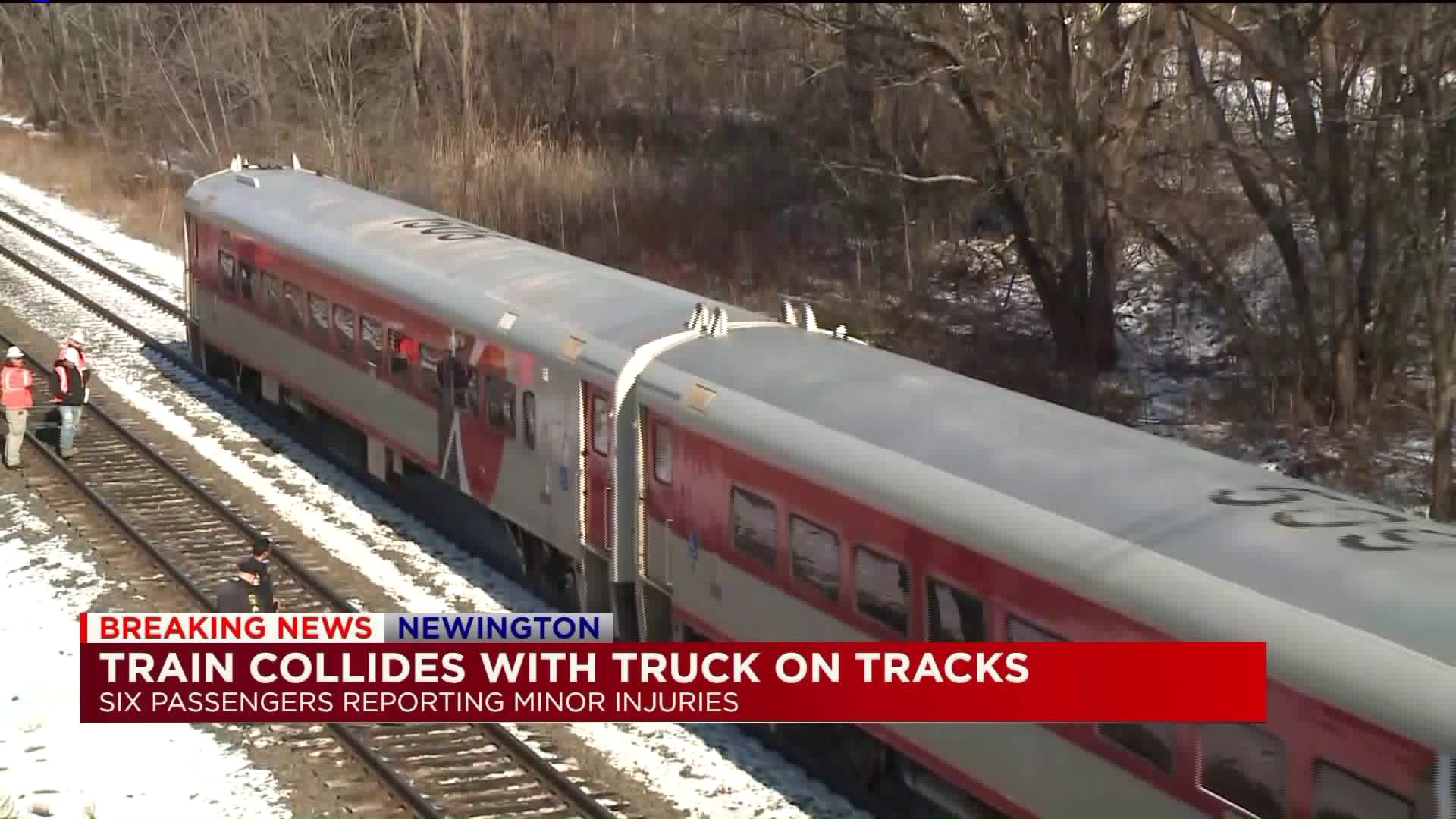 Amtrak workers escape truck moments before train crash in Newington