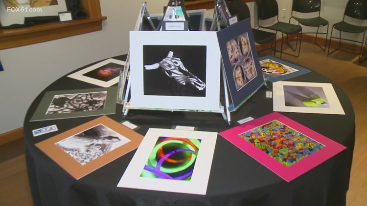 Southington art students auction work to get service dog for community member