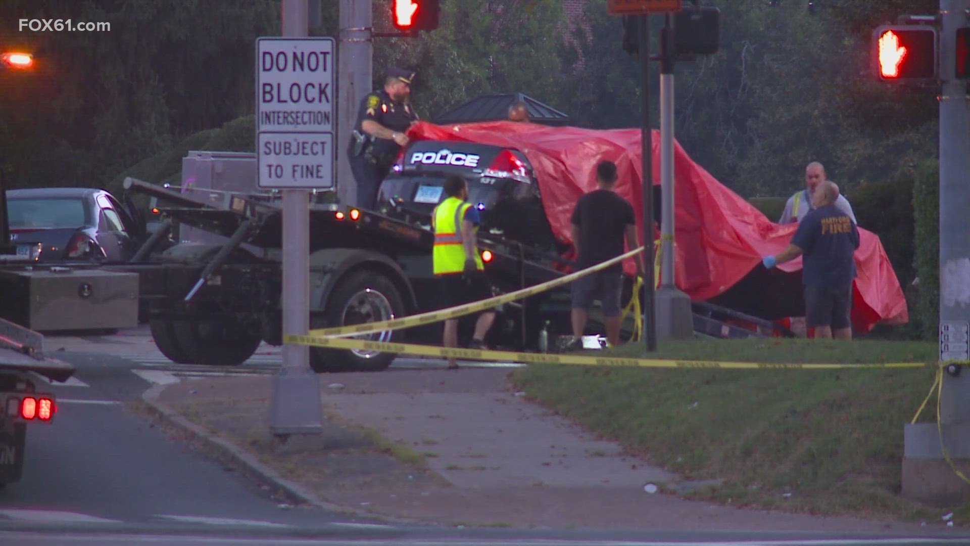 A Hartford police officer was killed and another seriously injured in an early overnight crash. A suspect is in custody.