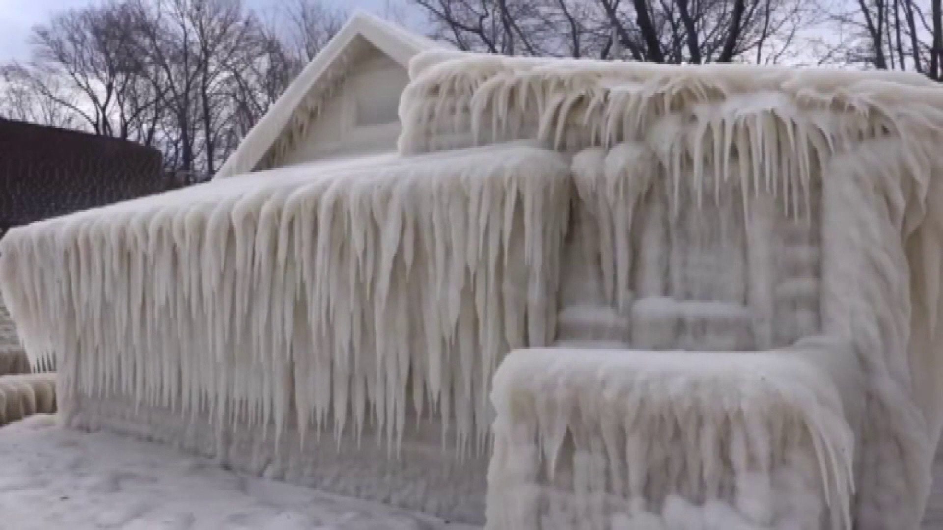 Lakefront house in Webster, New York covered in ice
