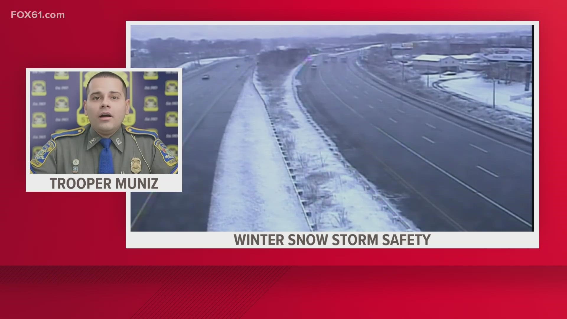Connecticut State Police Trooper First Class Pedro Muñiz reminds drivers to avoid driving during the snowstorm, or drive slowly if they must go out.
