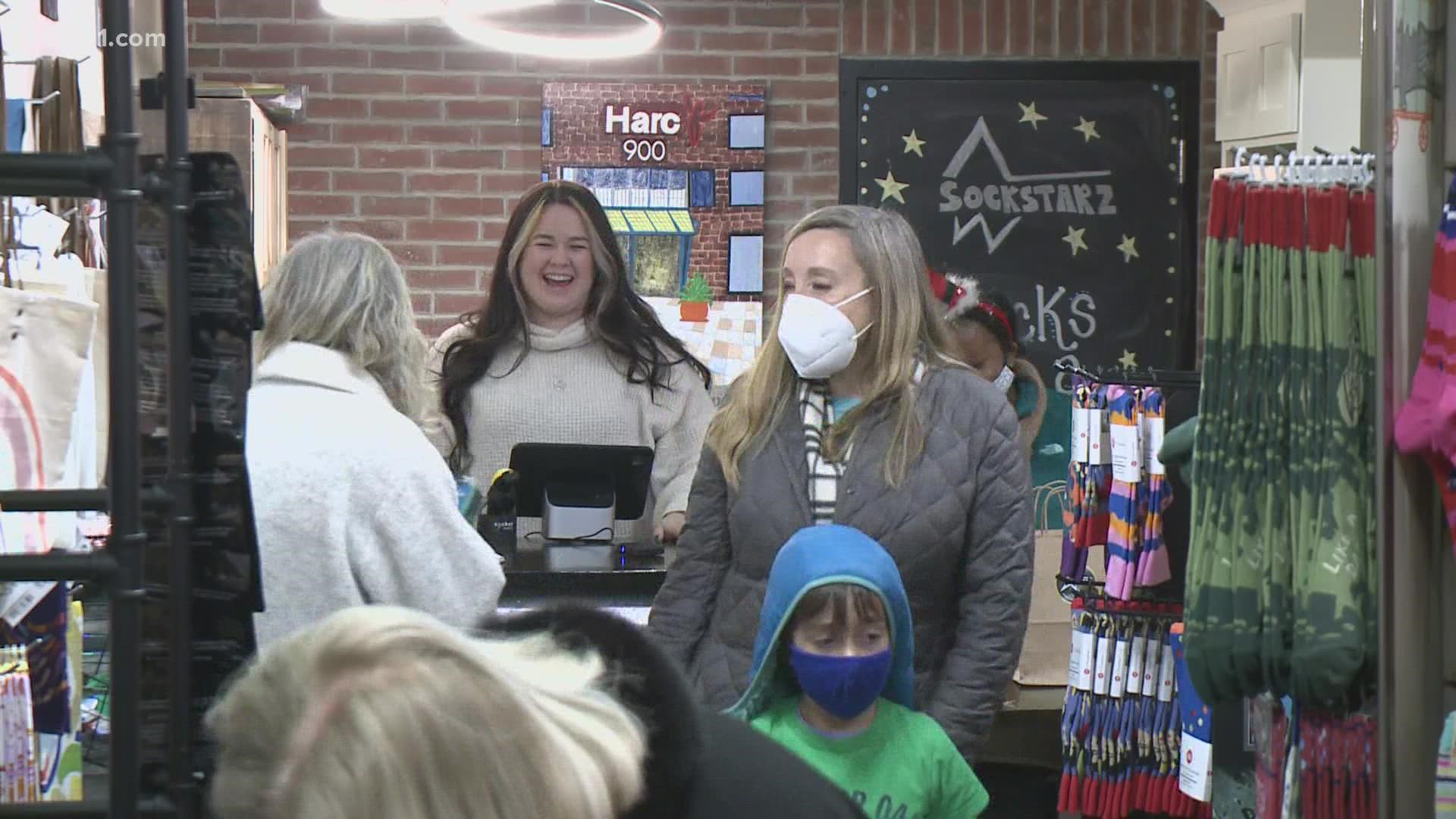 With Christmas only two days away, Downtown West Hartford was filled with crowds looking to purchase last-minute gifts.