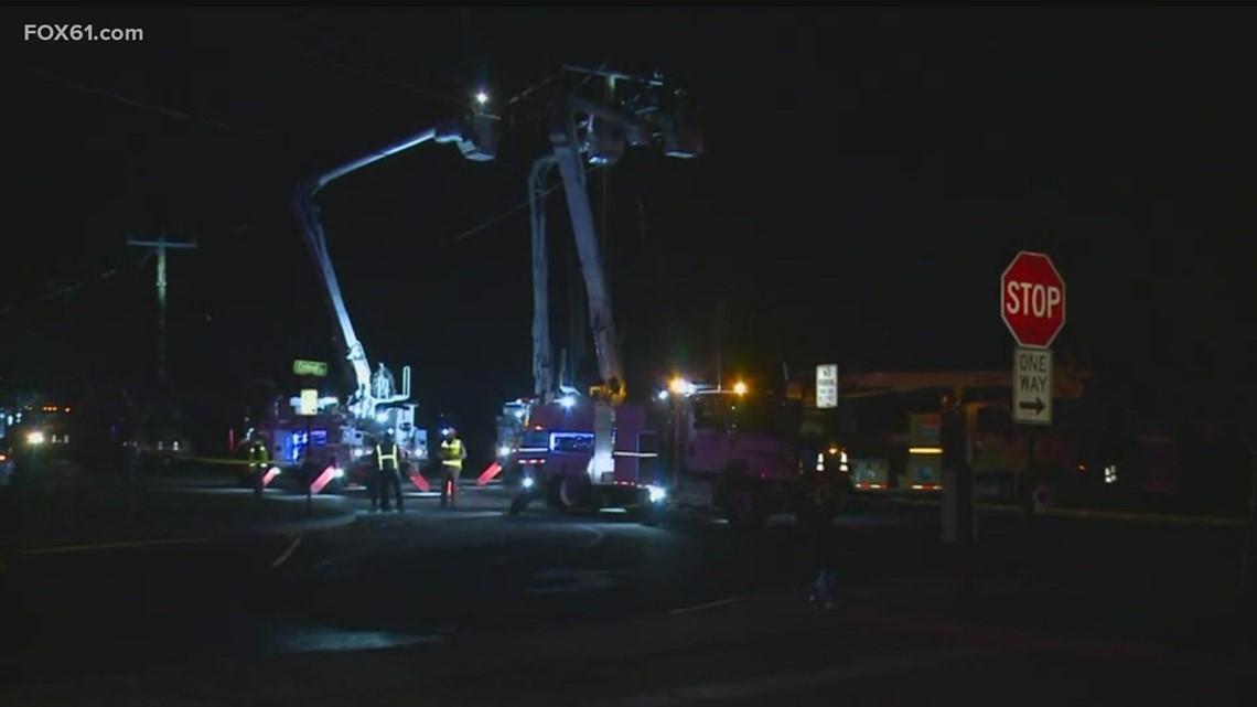 Crews working to restore power after Mystic fire