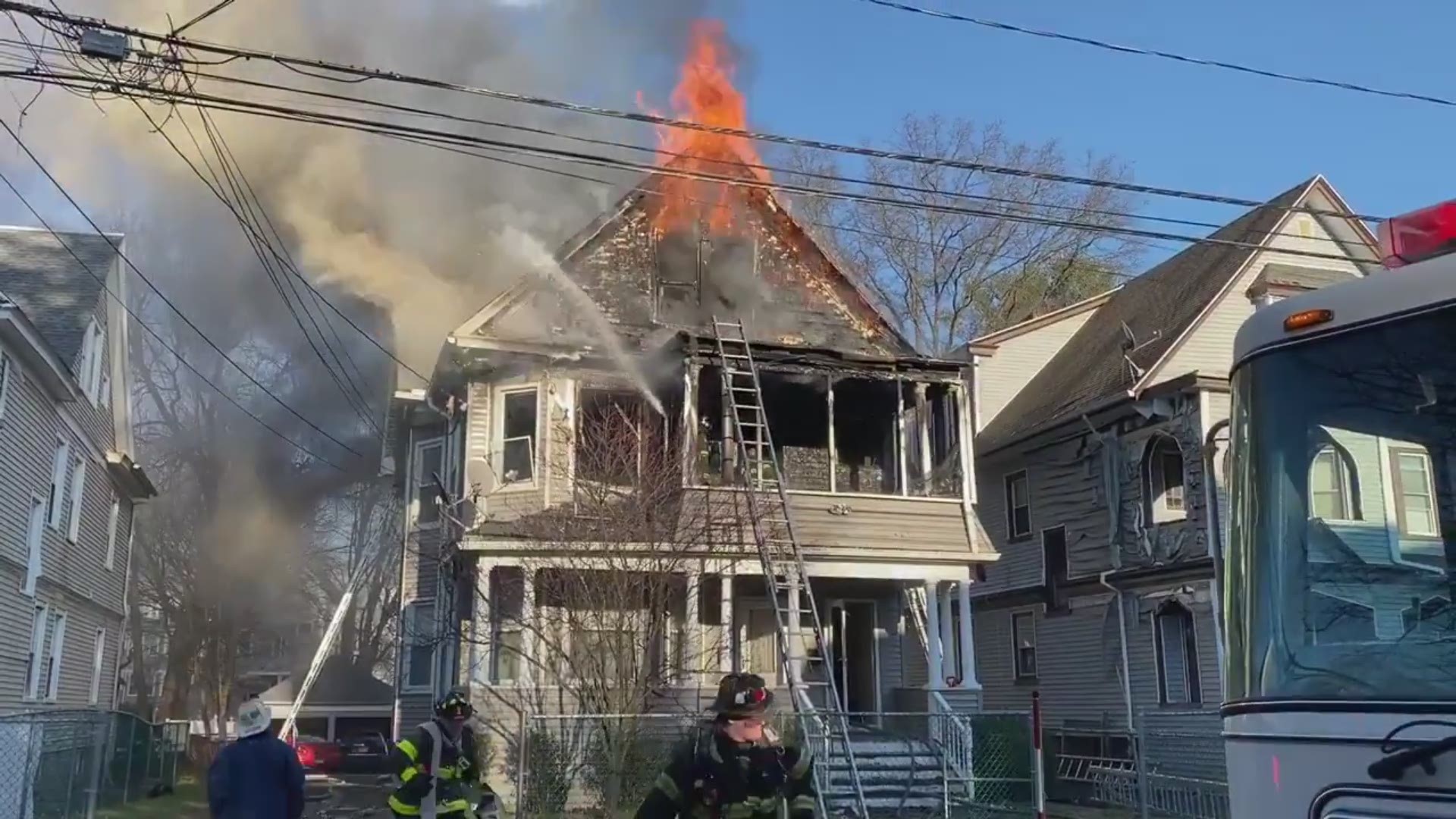 Fire location: 93 Blake St. Reported as flames in the building