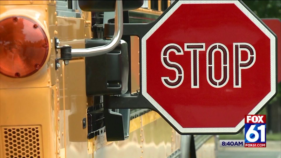 Cars driving past bus stop signs are causing a concern as kids head ...