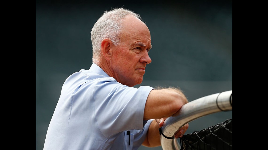 New York Mets pitcher John Maine watches the Colorado Rockies take