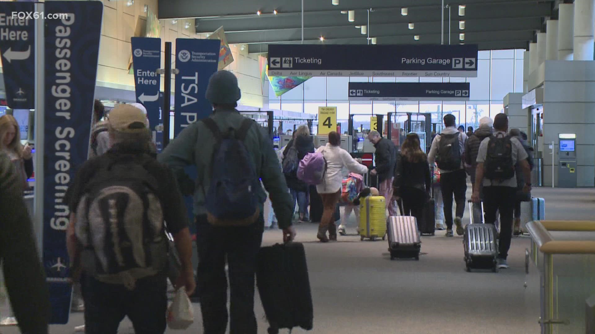 Thousands of people boarded planes across the country Tuesday on the busiest travel day before and after Thanksgiving.