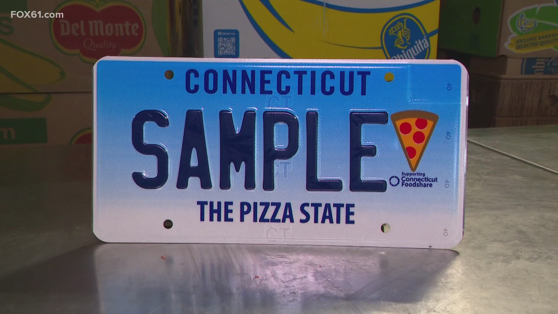 The pizza-themed plate includes Connecticut Foodshare's logo to bring awareness to their mission of combating food insecurity.