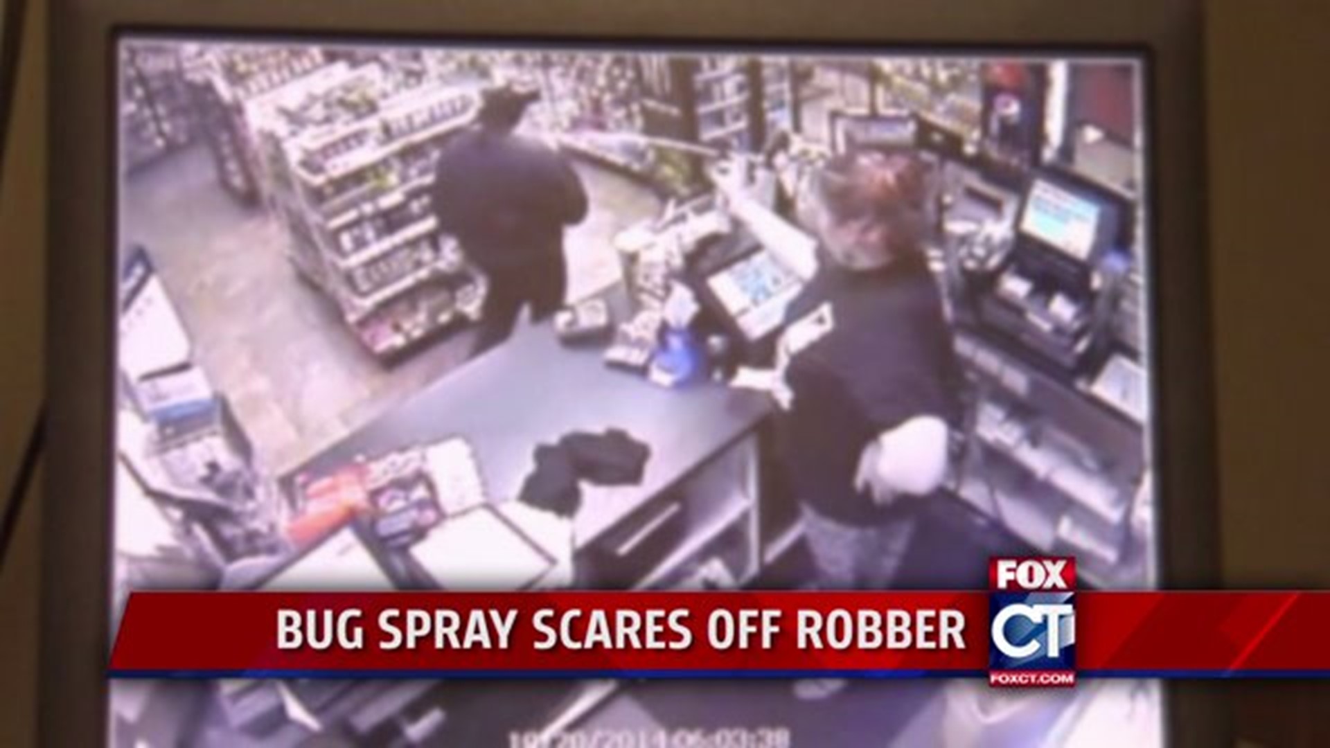 MUST WATCH: Cashier scares off robber with bug spray