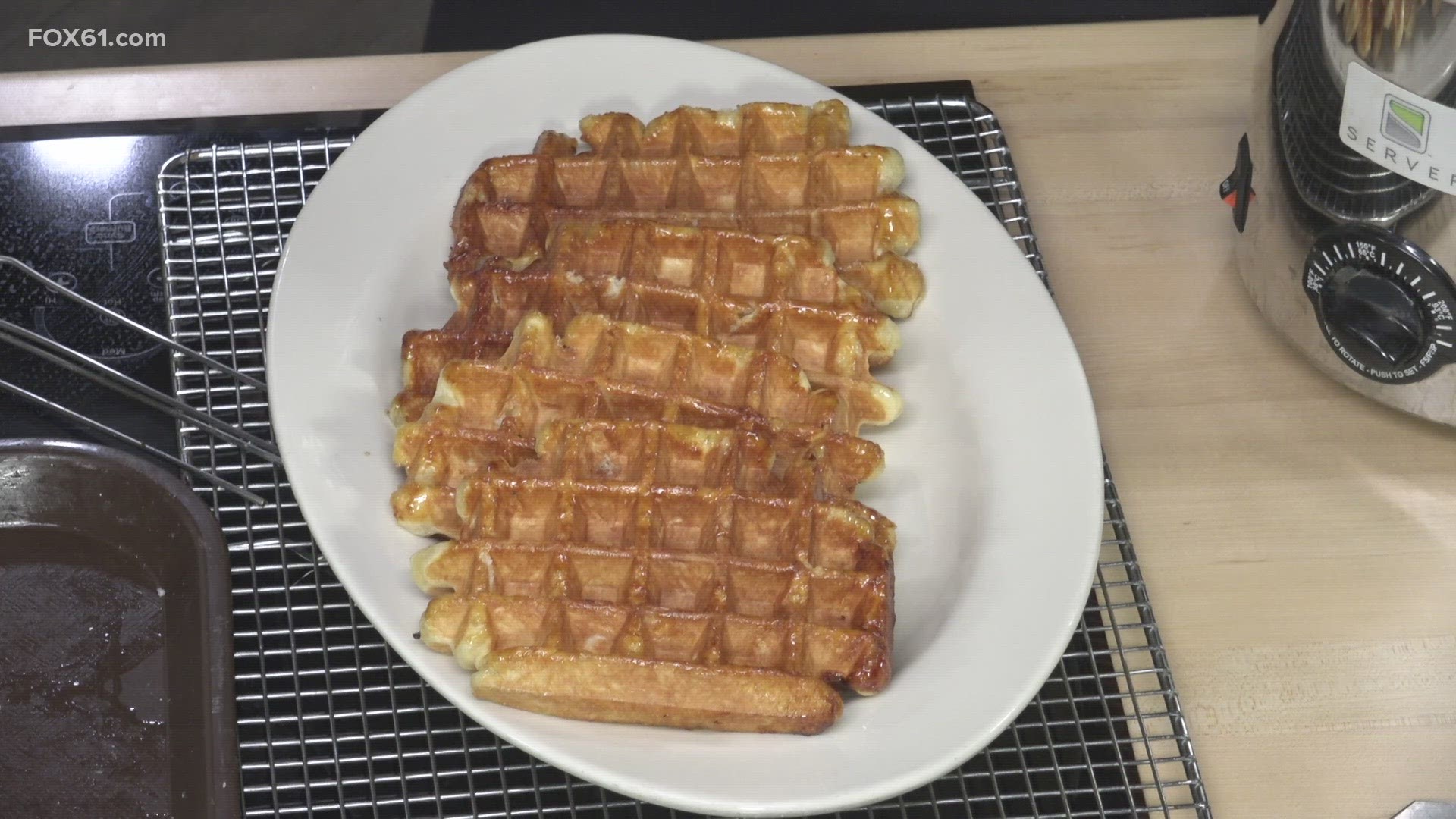 These waffles from Waffle Cabin are made from a dough, not a batter. The new location is at the Shops at Evergreen Walk in South Windsor.