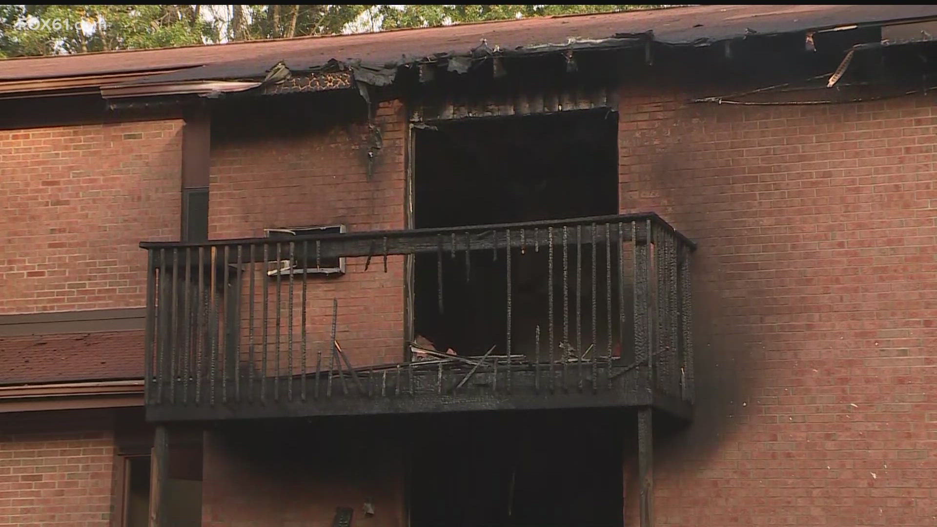 Officials said a person of interest is in custody after a fire broke out early Friday morning in Bloomfield.