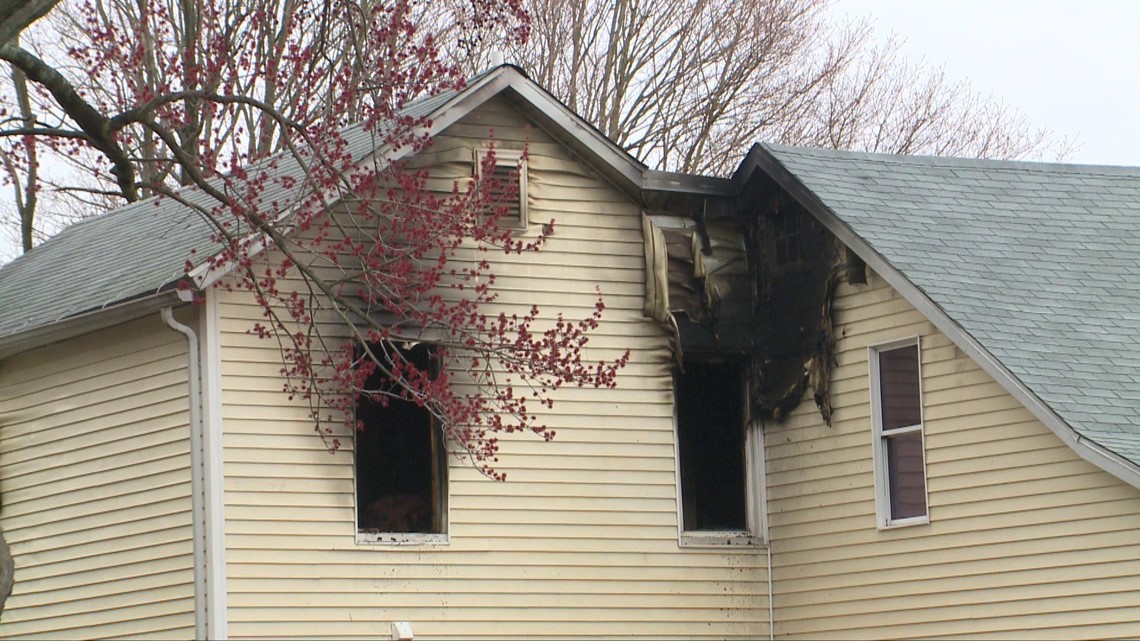 Woman rescued from fire in Wolcott