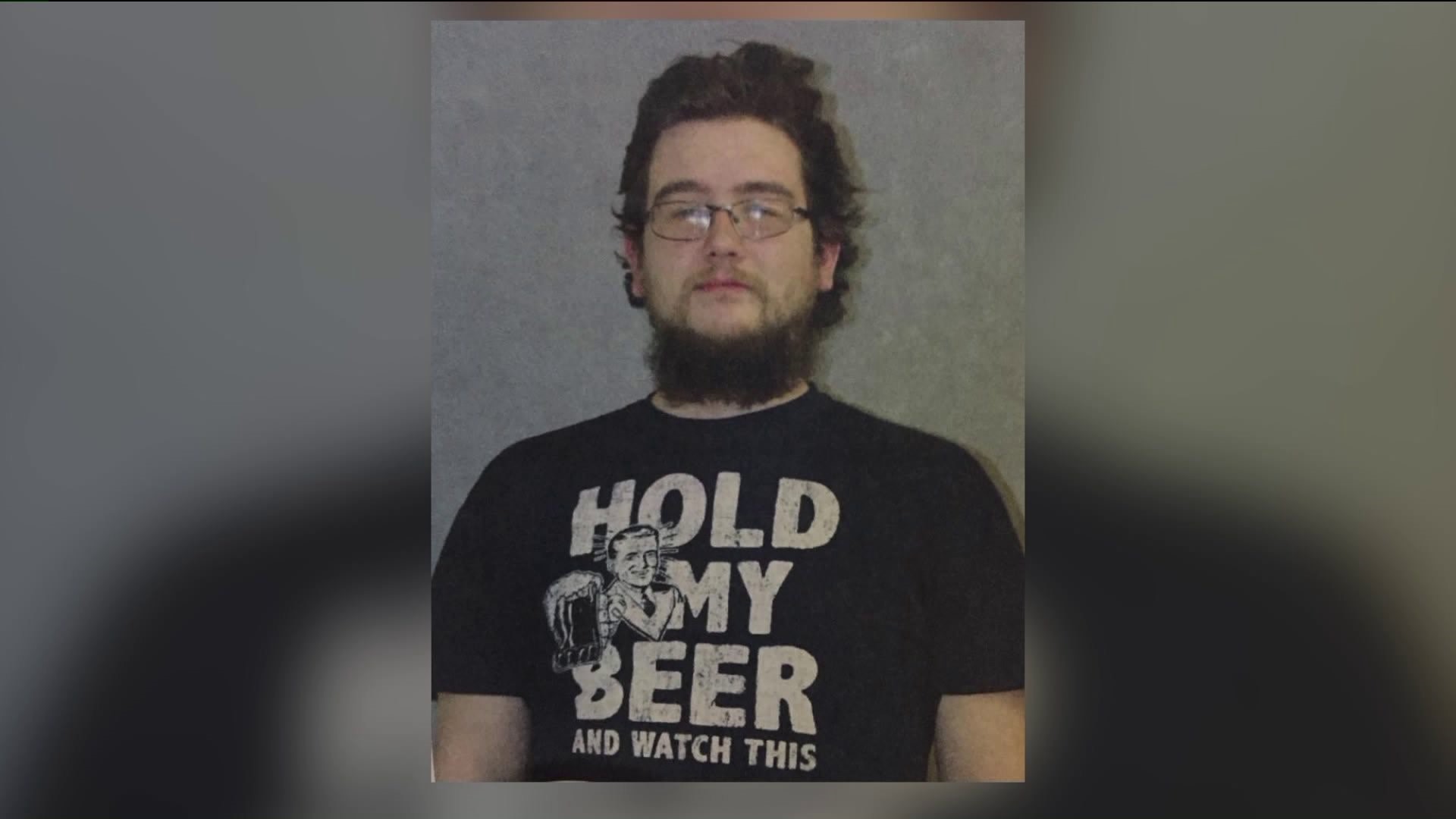 Ironic fashion? Man charged with DUI wearing `Hold My Beer` shirt