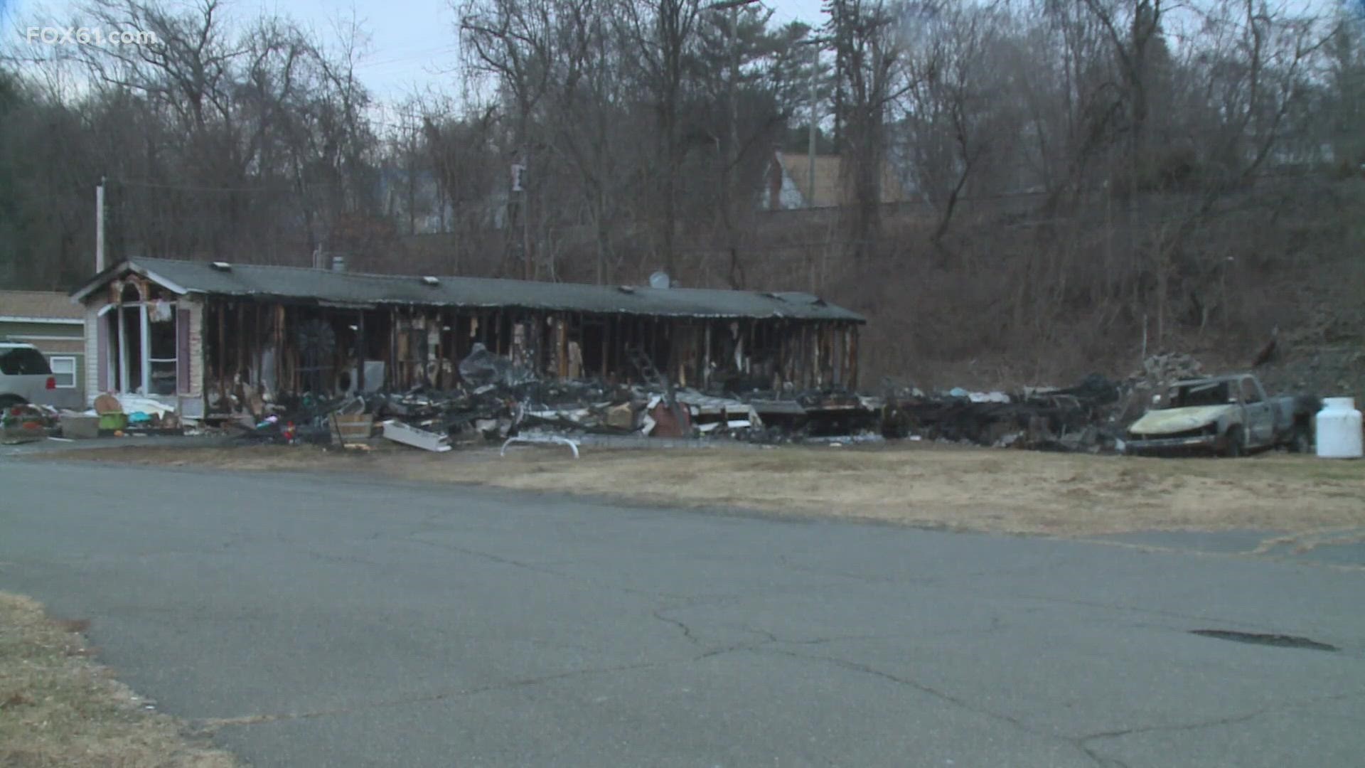 An overnight fire that destroyed two trailers and multiple vehicles in Middletown is being investigated by police and the Fire Marshal's office.