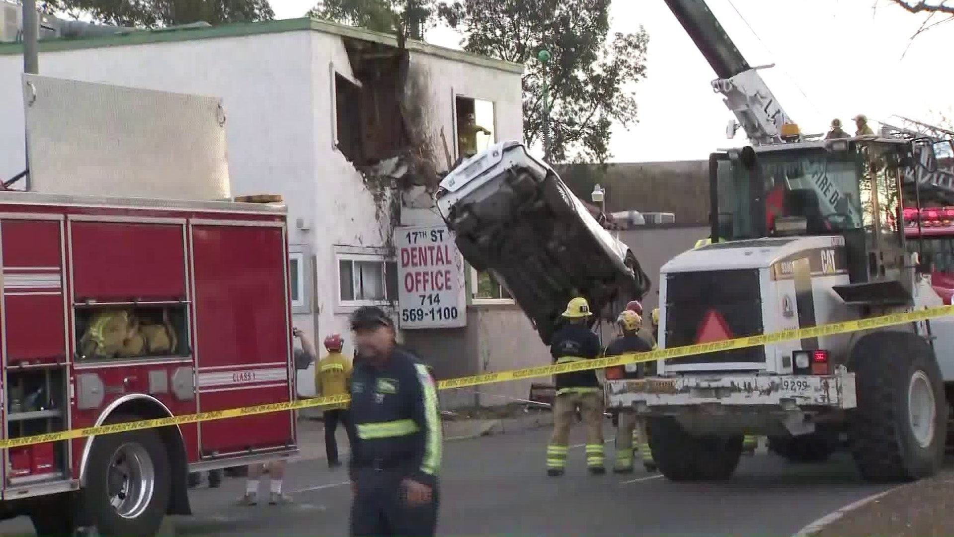 WATCH: Car flies into second floor of building and gets stuck | fox61.com