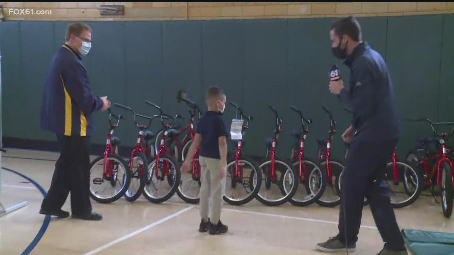 First graders at Kennelly Elementary School in Hartford were surprised with new bikes.