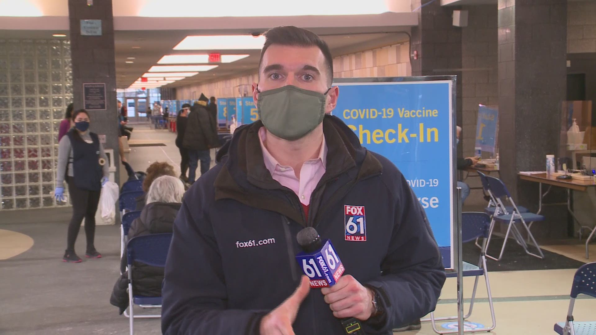 The doctors giving the shots were not the only married couple at the Valentine's Day vaccination clinic.