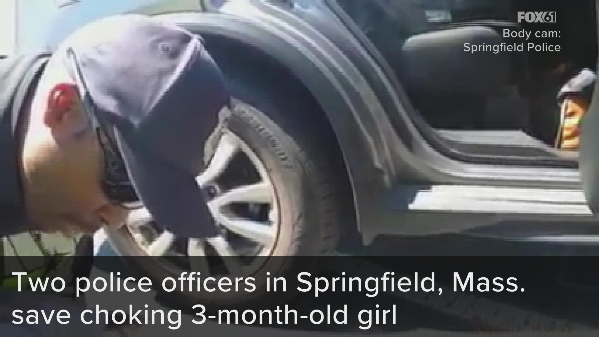 Springfield police officers Christopher Charles and Luis Rodriguez sprung into action after a mom got out of her car and screamed that her baby wasn't breathing