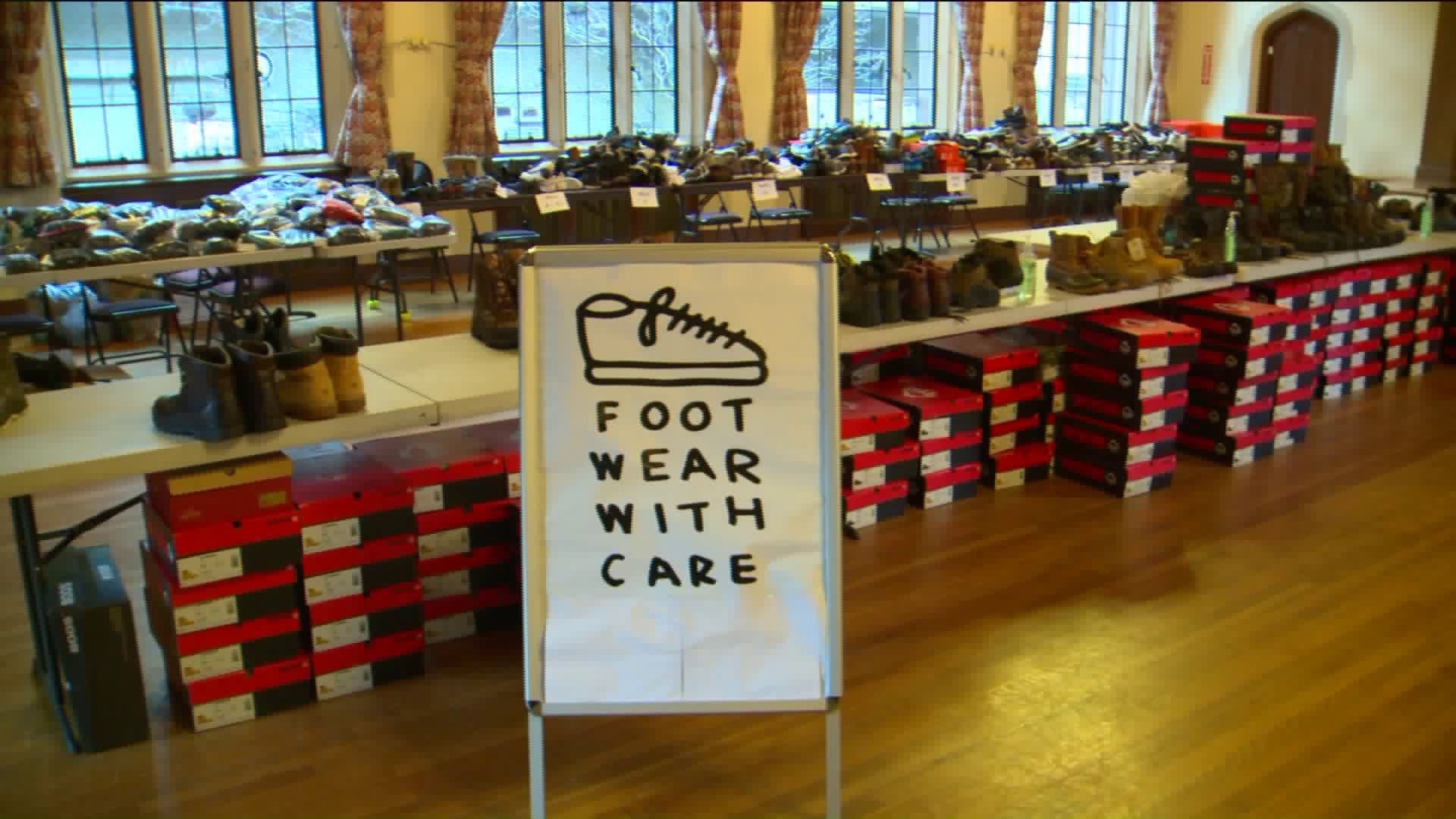 Hundreds of homeless people line up for free boots in Hartford