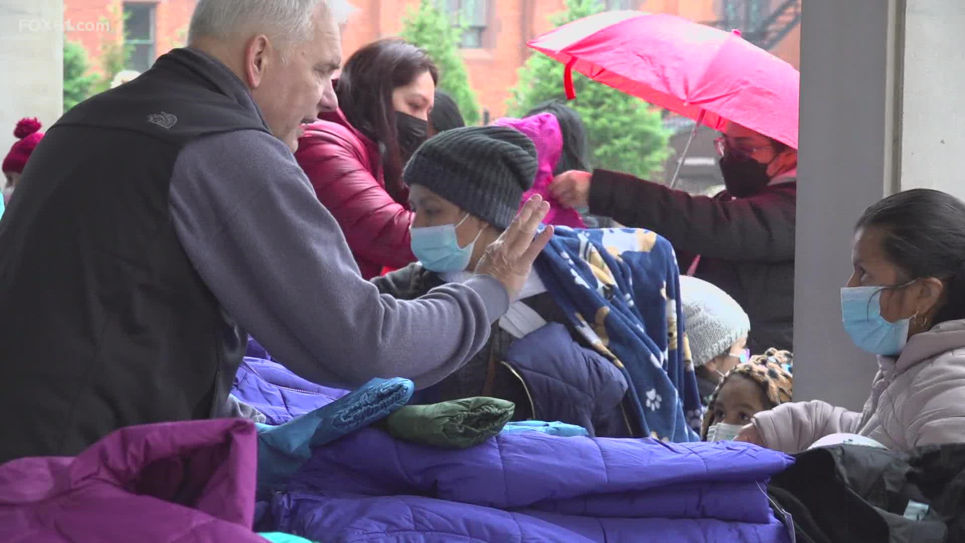 The Friday morning rain did not stop lines growing outside the Cathedral of St. Joseph in Hartford for the Knights of Columbus annual Coats for Kids drive.