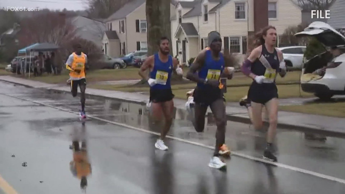 Runners compete for lowest bib number in "the Race before the Manchester Road Race"