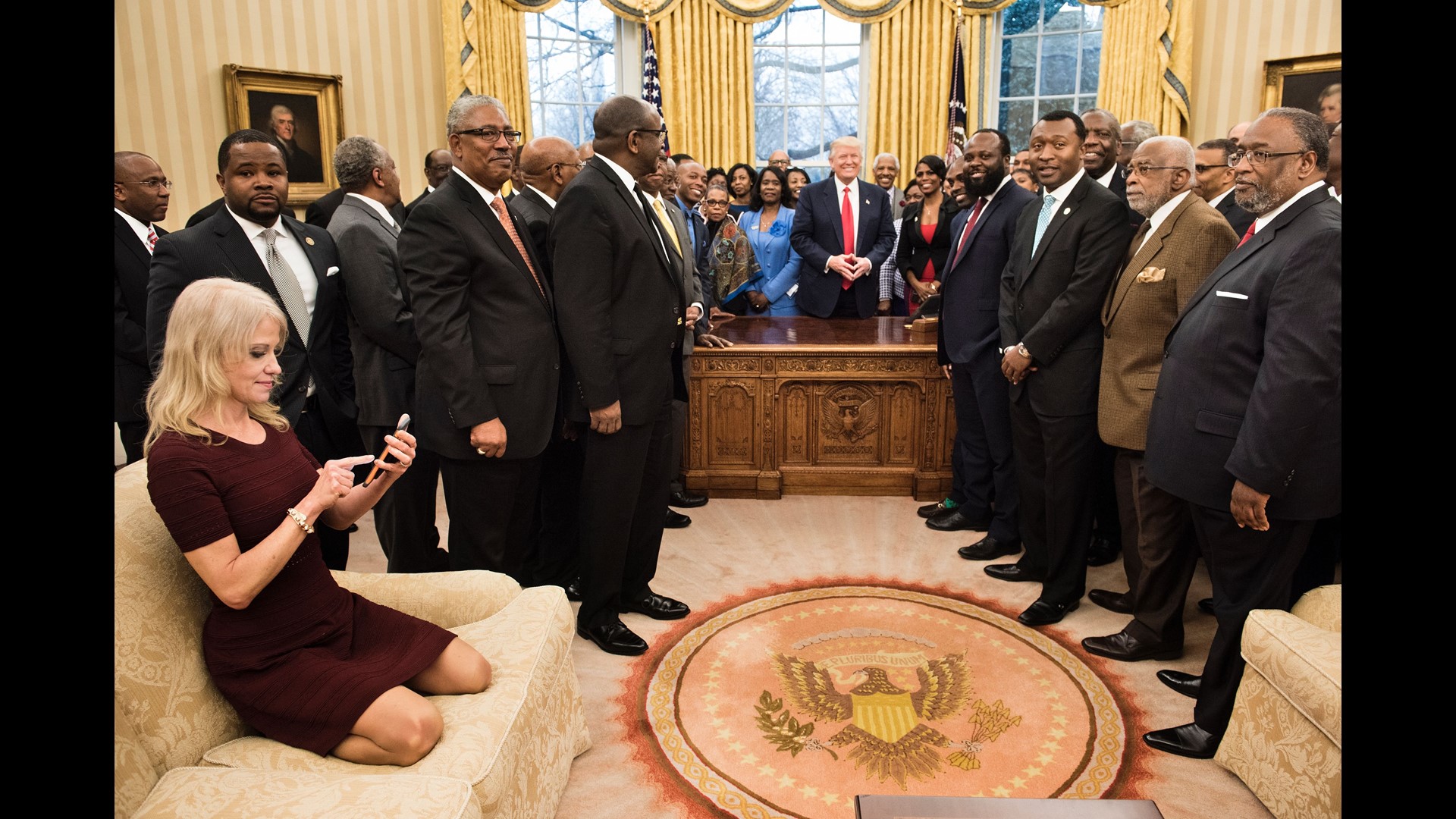 Kellyanne Conway kneels on Oval Office couch, sparks debate