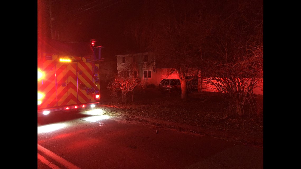 Clinton man rescued after trapped in a house fire