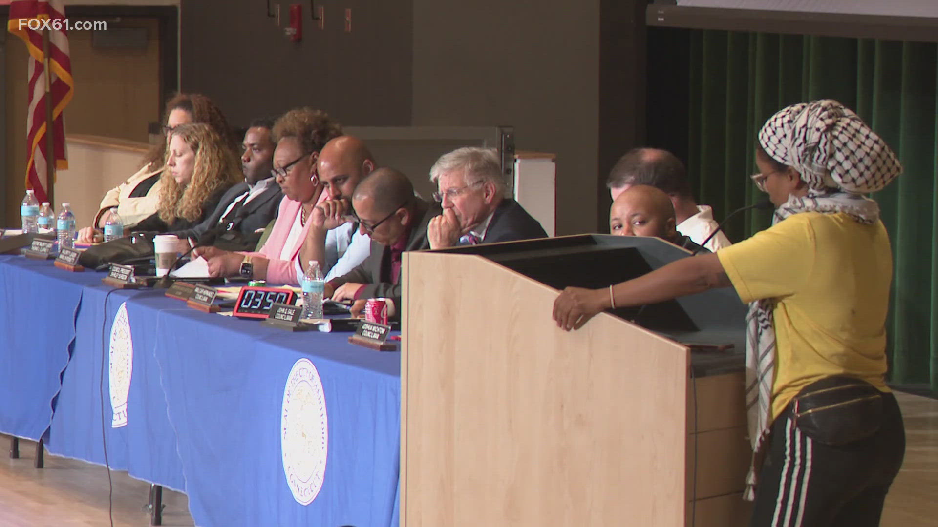 Teachers and students rallied outside Weaver High School in Hartford on Tuesday demanding more money from city leaders, hoping to save jobs and resources.