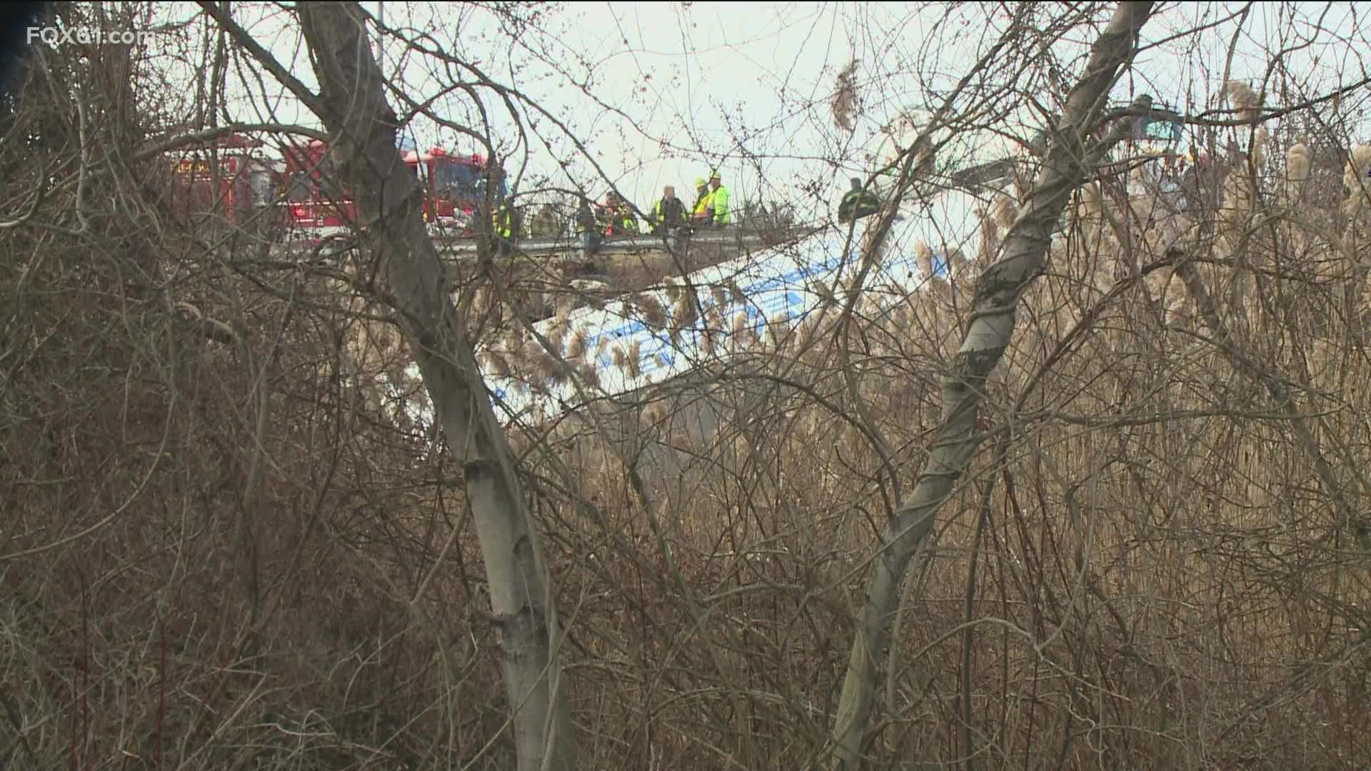 A tractor-trailer is down an embankment off of I-91 in Enfield. No injuries have been reported yet.