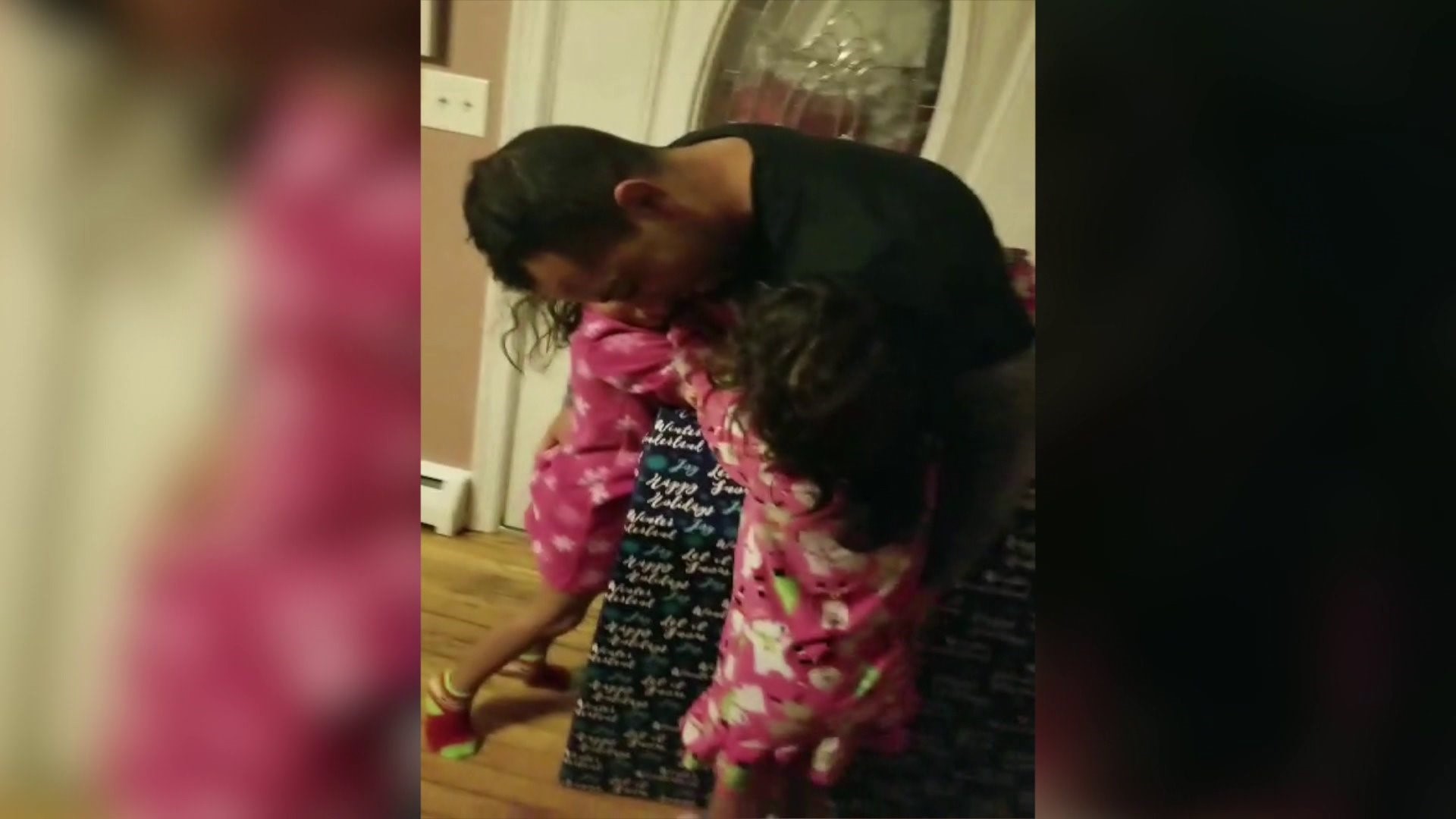 Dad surprises twin girls for Christmas
