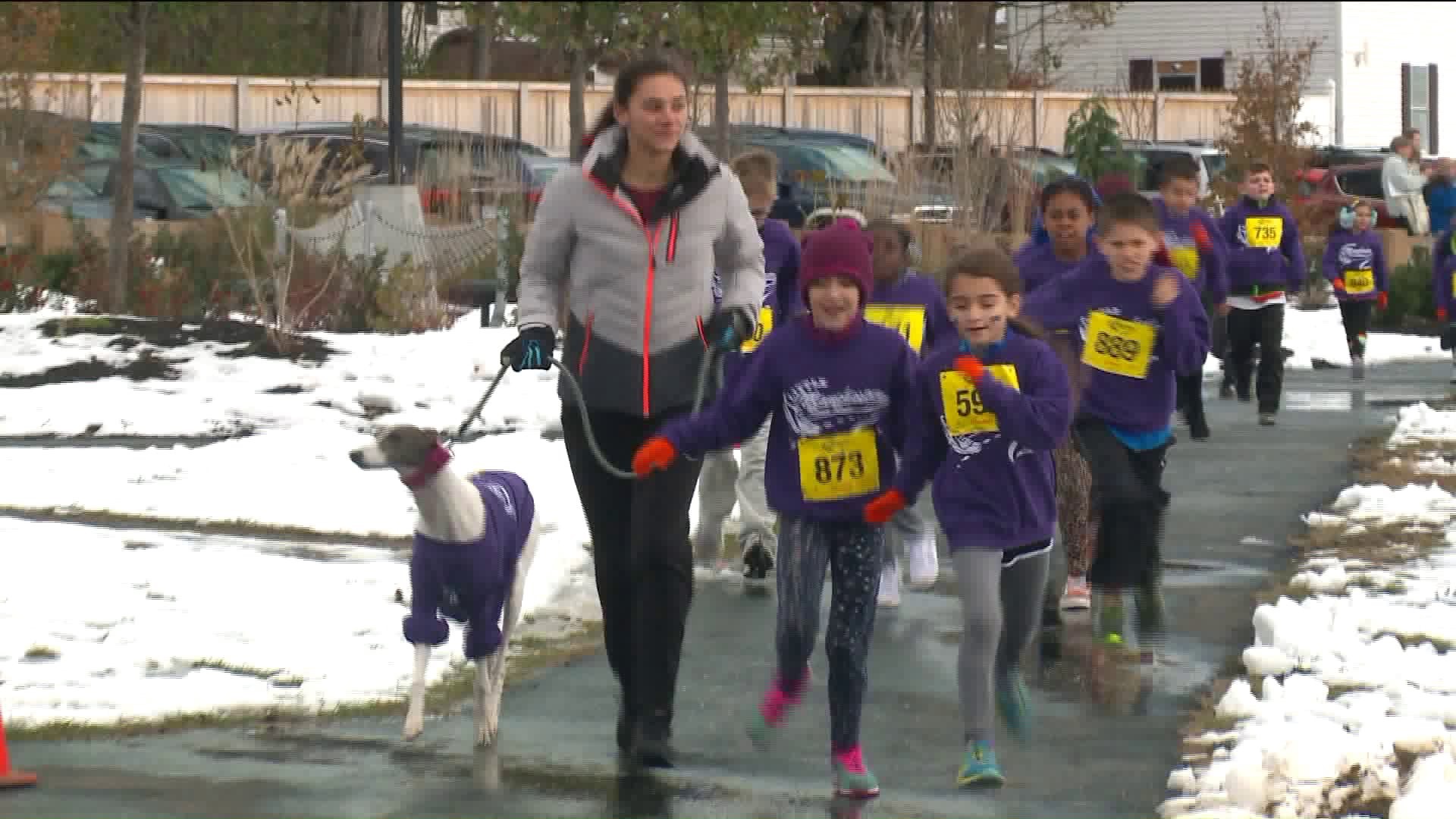 Hundreds participate in the Manchester Road Race despite snow and ice