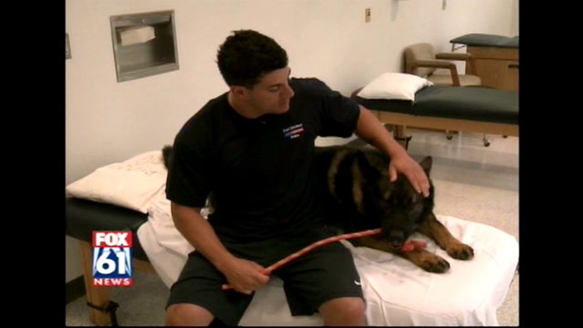 Officer Todd Mona and K9 Primo recover together