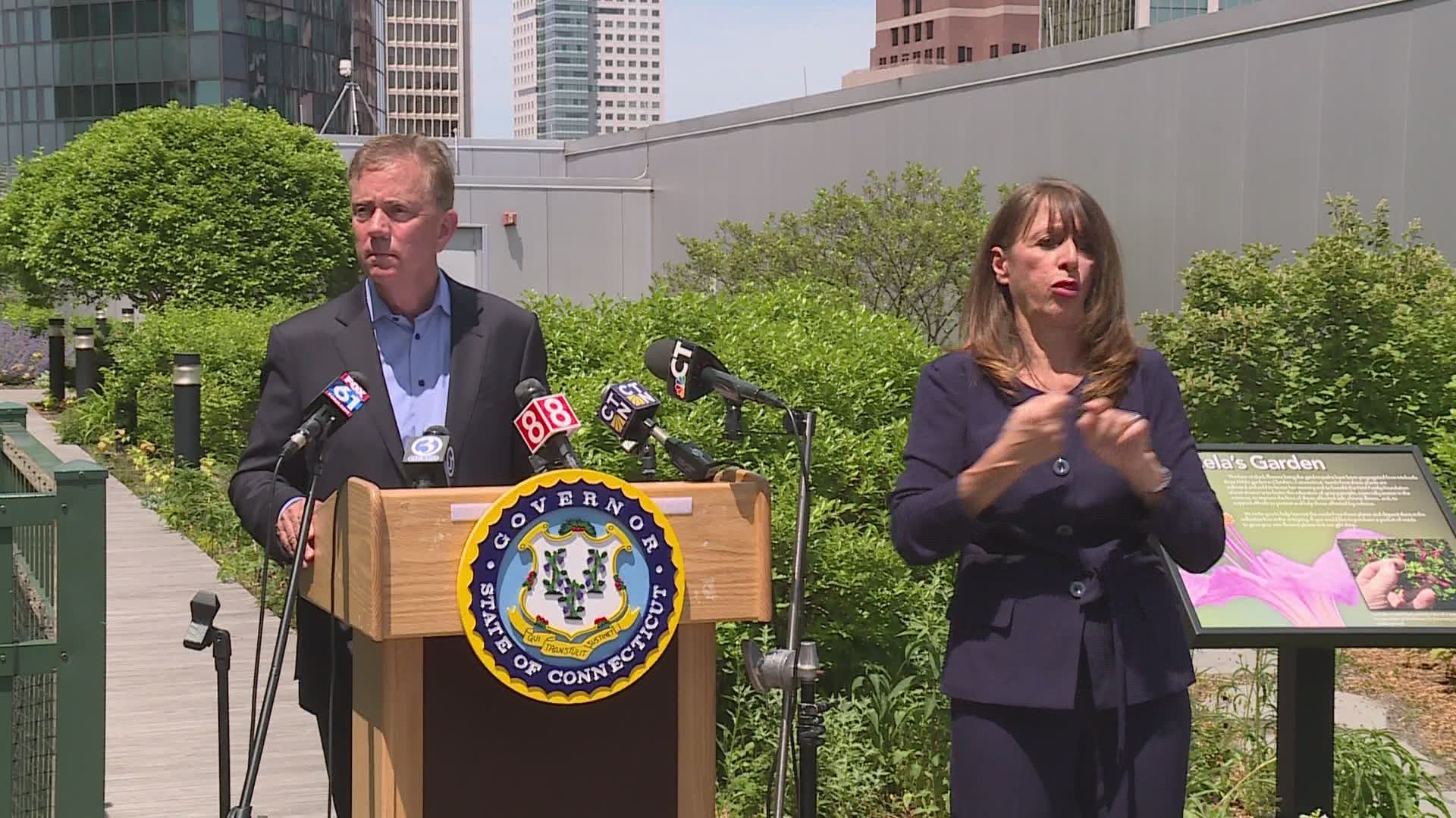 The briefing was held outside on the plaza level of the Connecticut Science Center. Gov. Lamont was be joined by its president and CEO.