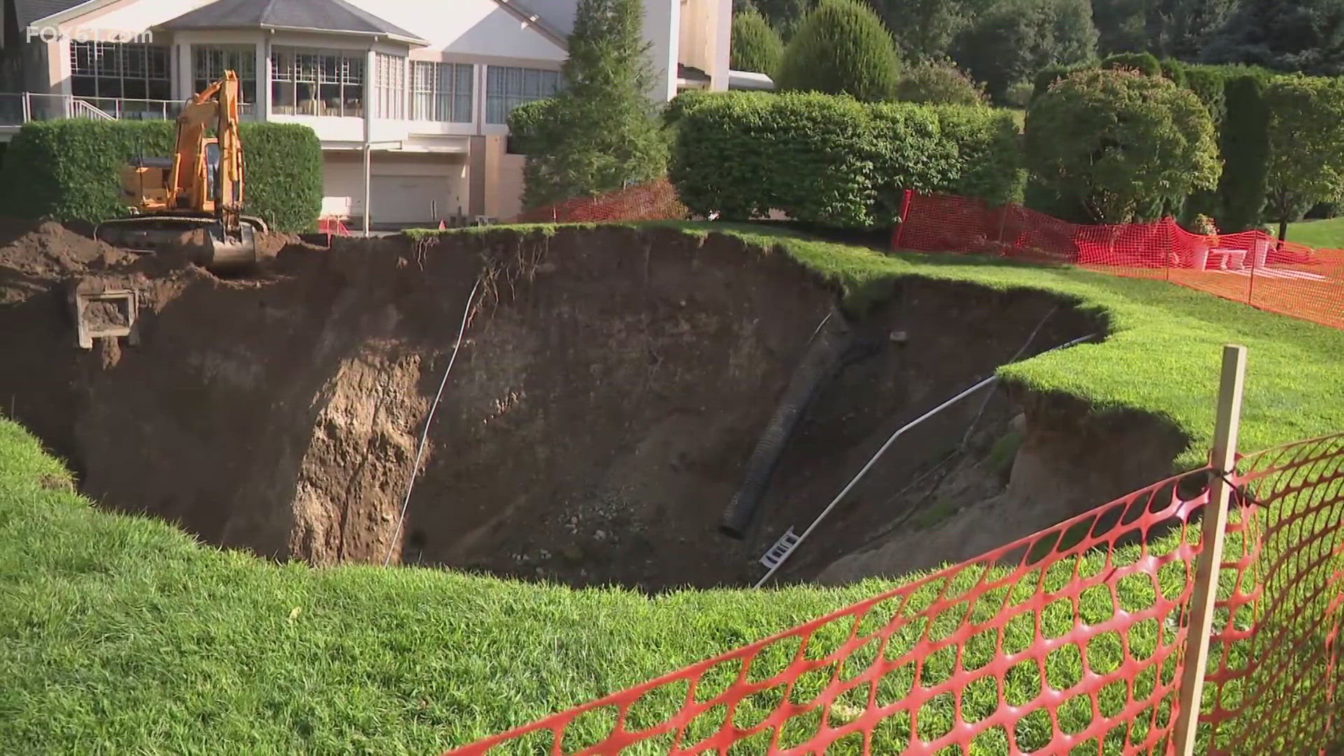 Flooding caused massive sinkhole at Waterview event in Monroe | fox61.com