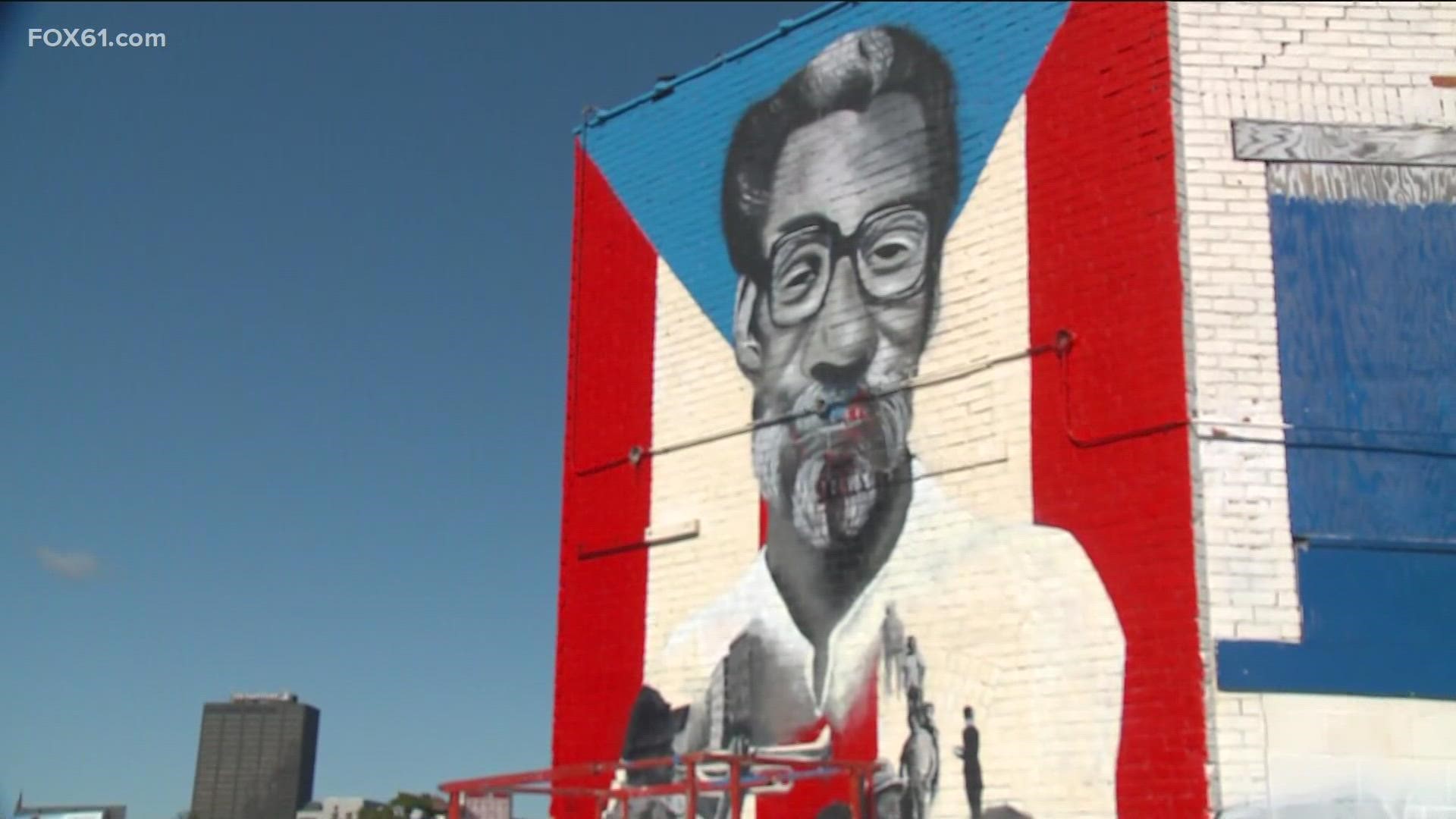 First-generation Latino artist Lindaluz Carrillo is putting the finishing touches on a new mural in Hartford to celebrate Hispanic Heritage Month.