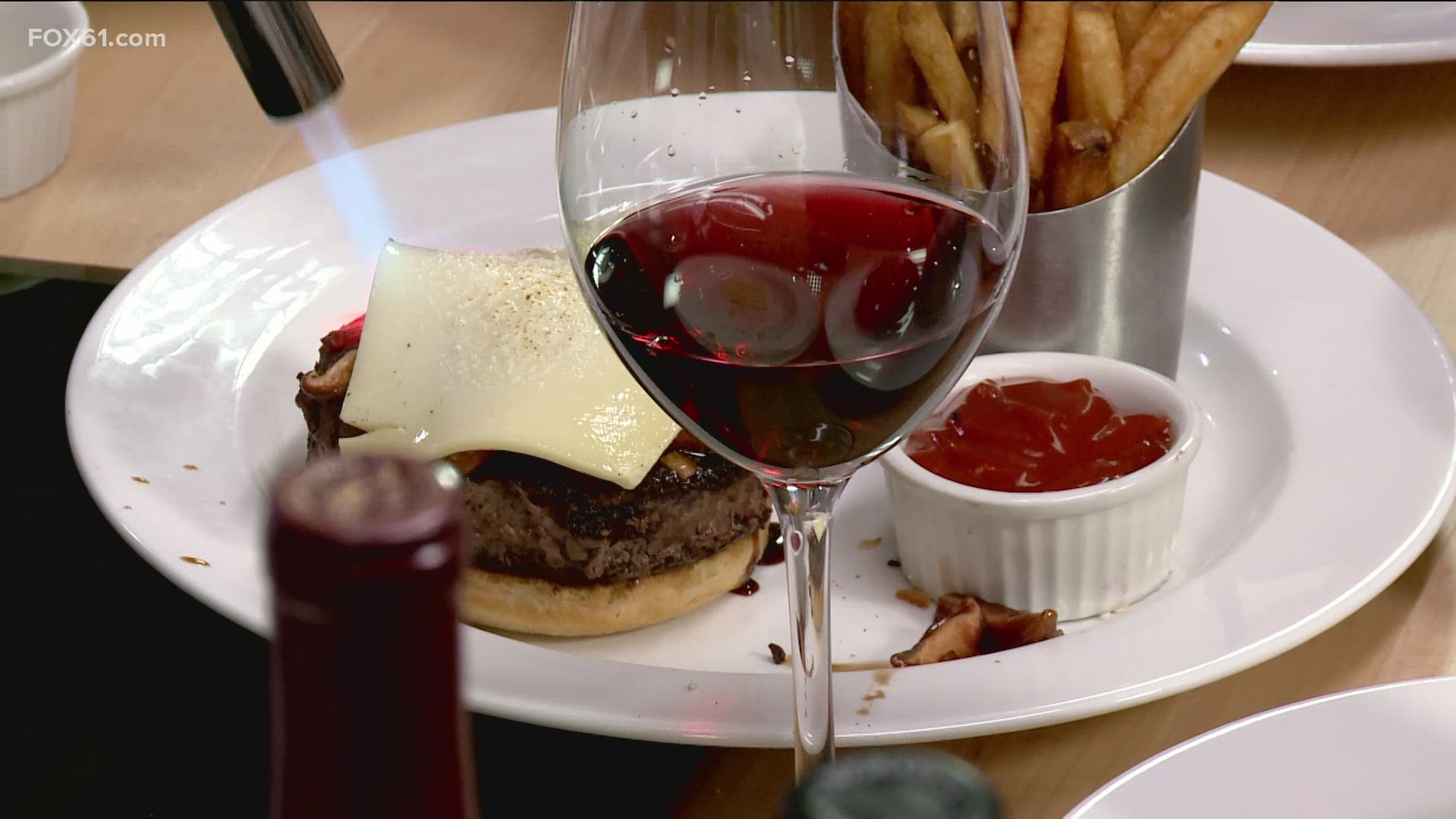 Carlos Slaughter and Jerry Cho from Hartford's Capital Grille demonstrate what guests can expect during their "Wagyu & Wine" event.