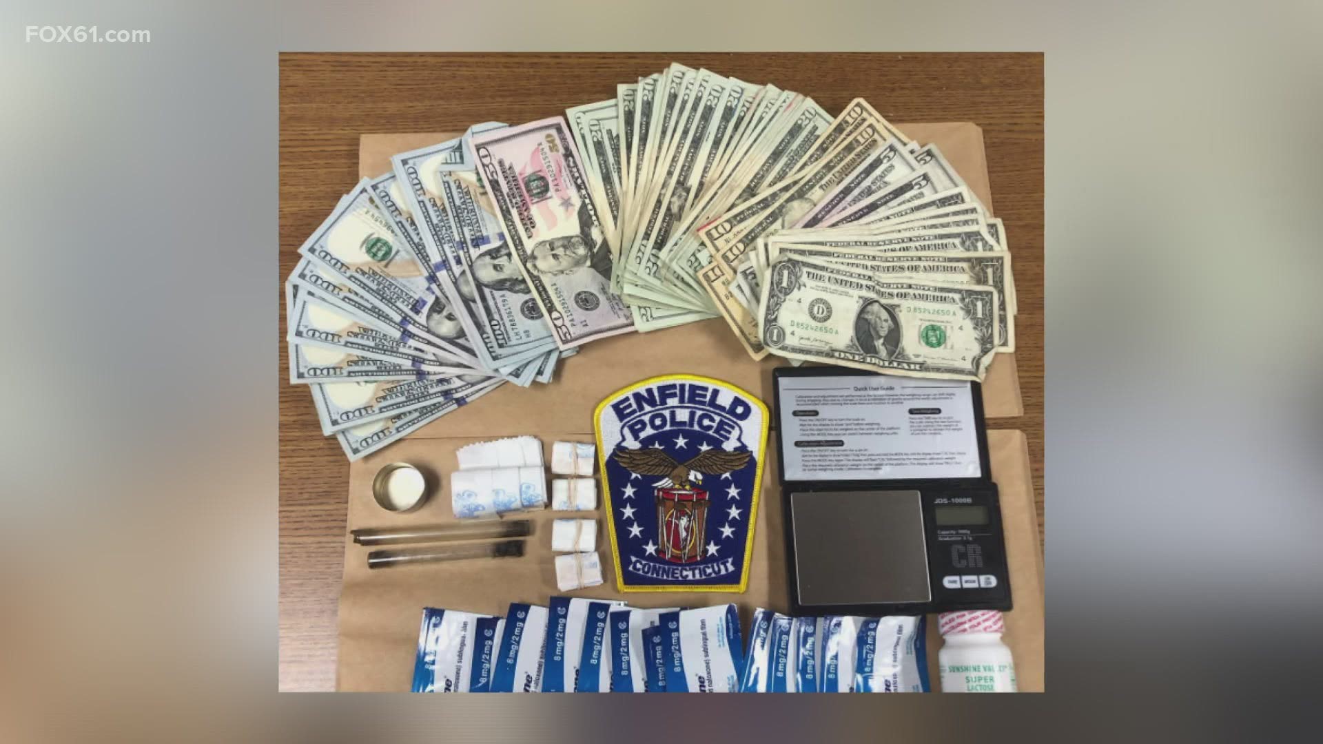 Police said the heroin, a large amount of cash, a scale, and other drug paraphernalia was seized.
