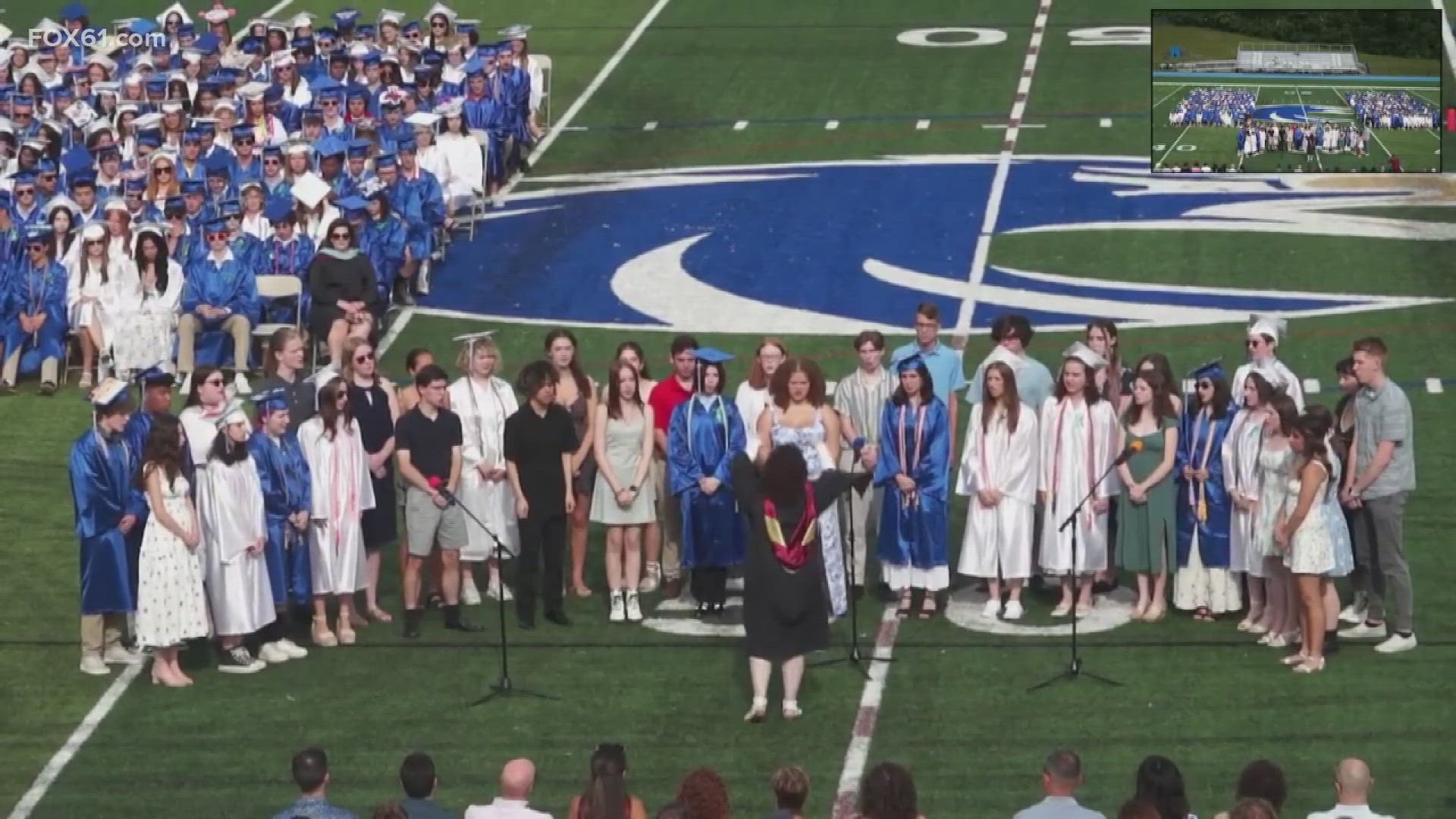 Newtown High school seniors graduated Wednesday evening, holding in their hearts the memory of 20 classmates who should have been there sharing their joy.